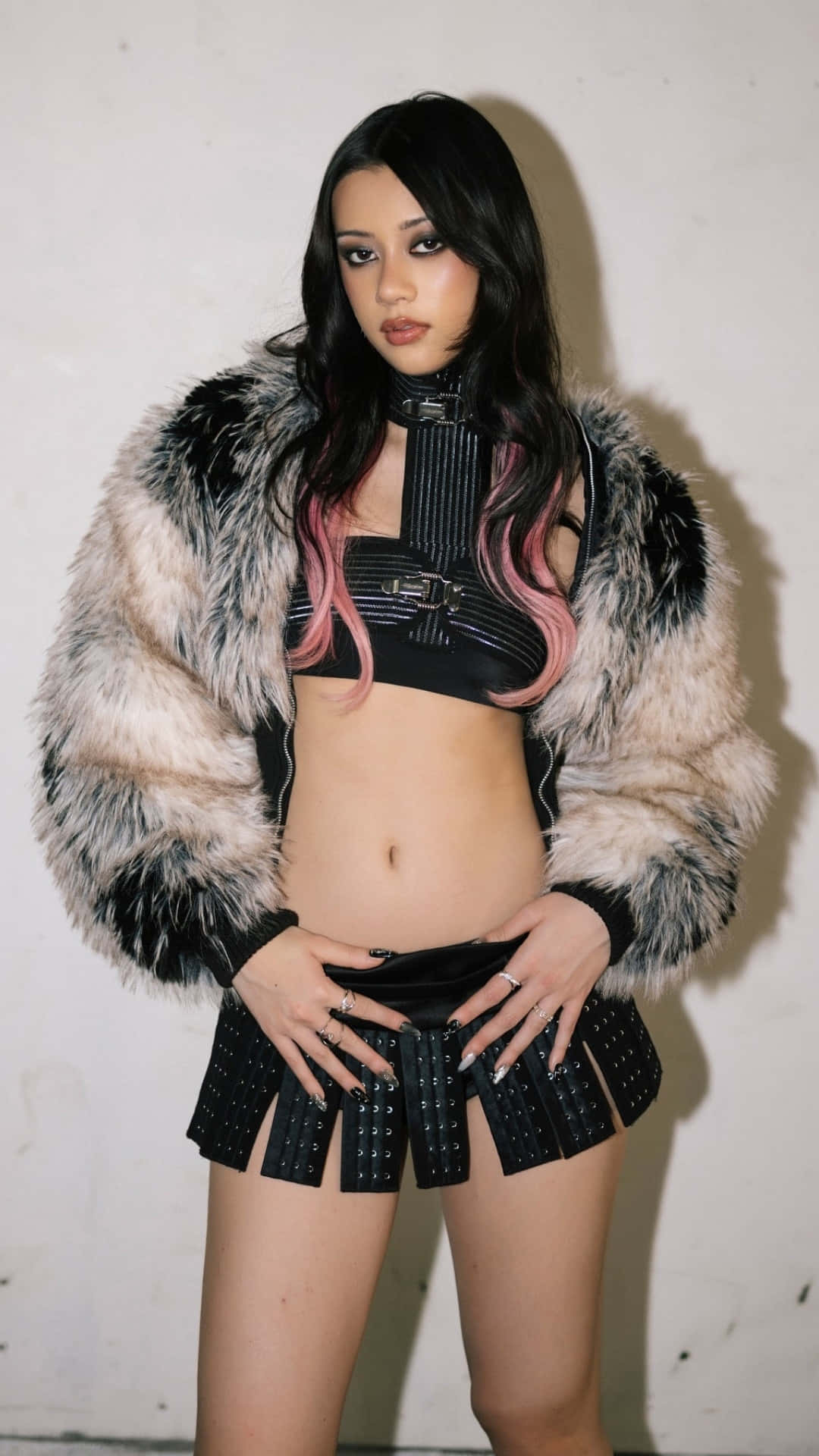 Megan Katseye, pink-tipped hair, black leather outfit, Full HD Phone Wallpaper