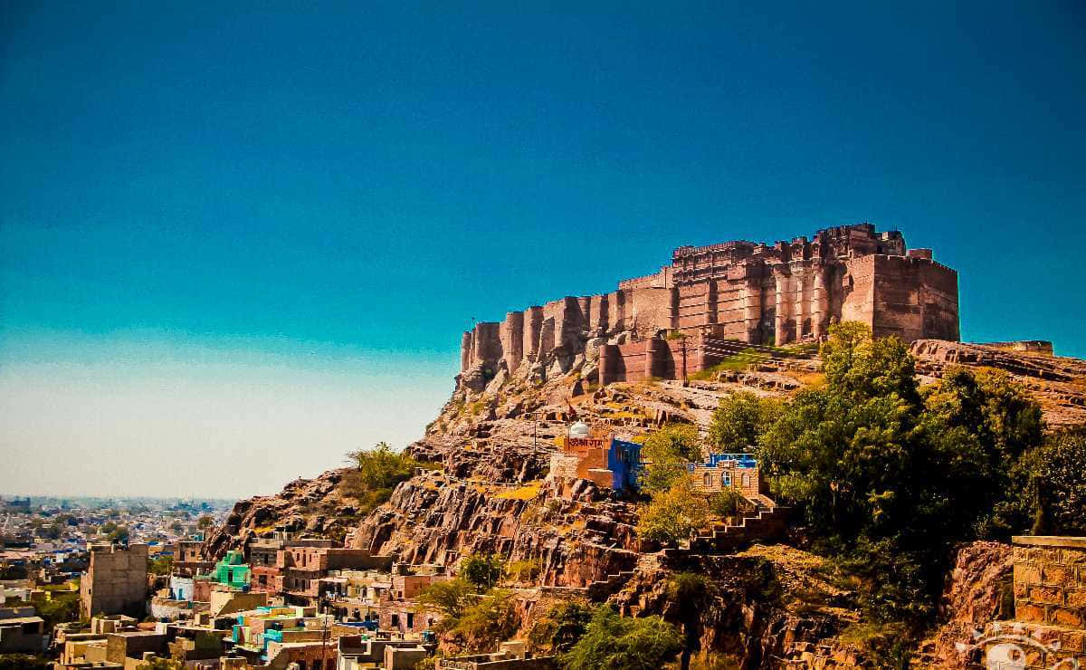 Mehrangarh Fort, clear blue skies, sunlit rocky hill, SD Desktop Wallpaper