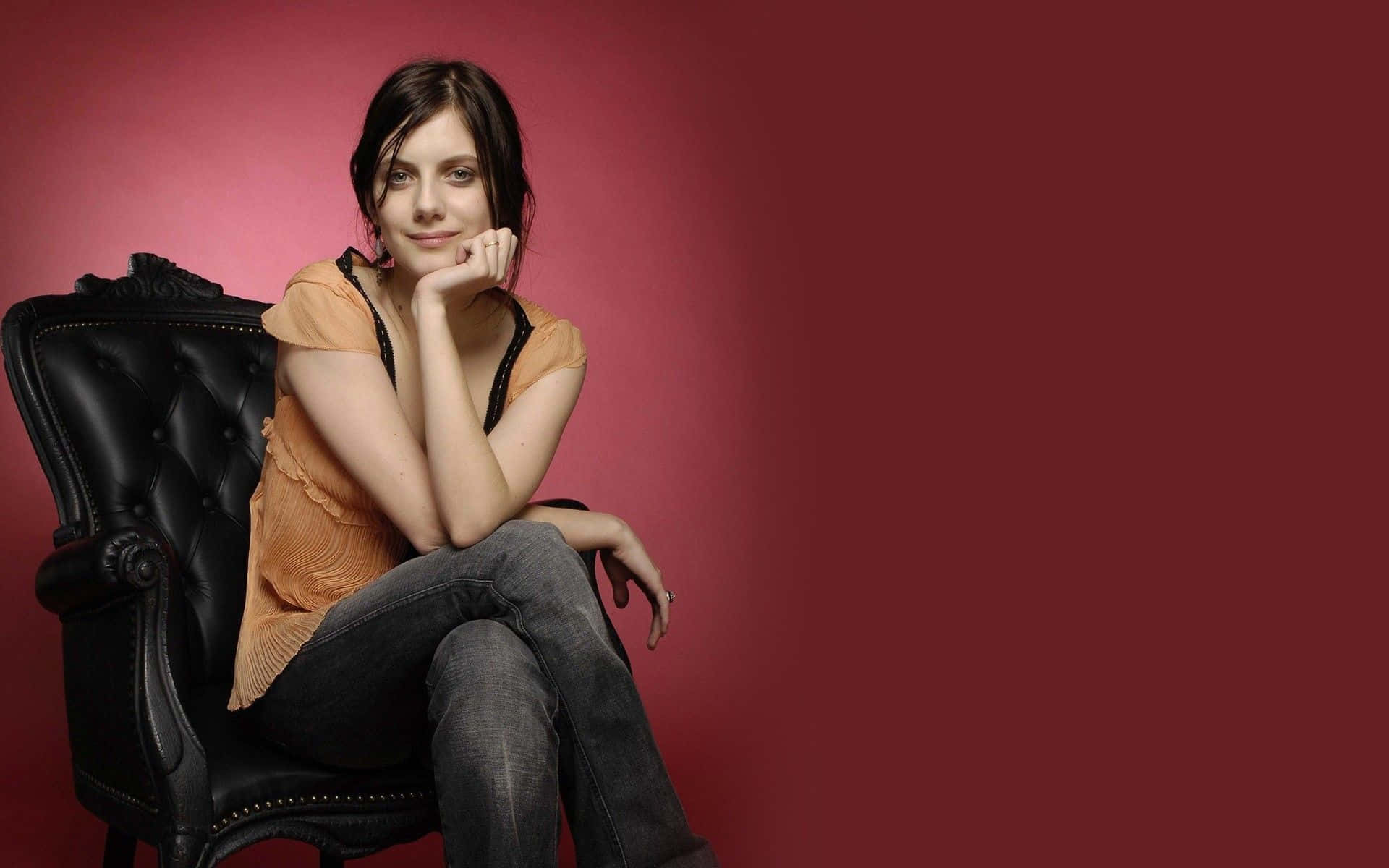 Mélanie Laurent, orange top, jeans, Full HD Desktop Wallpaper