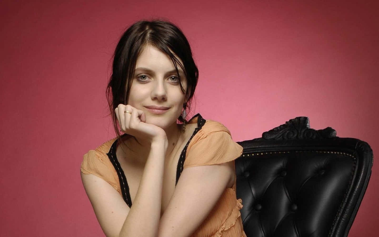 Mélanie Laurent, black tufted chair, solid pink backdrop, HD Desktop Wallpaper