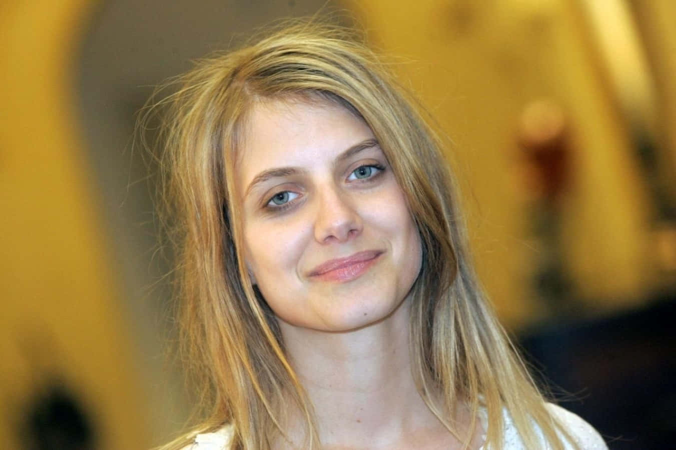 Mélanie Laurent, black ensemble, golden blurred background, HD Desktop Wallpaper
