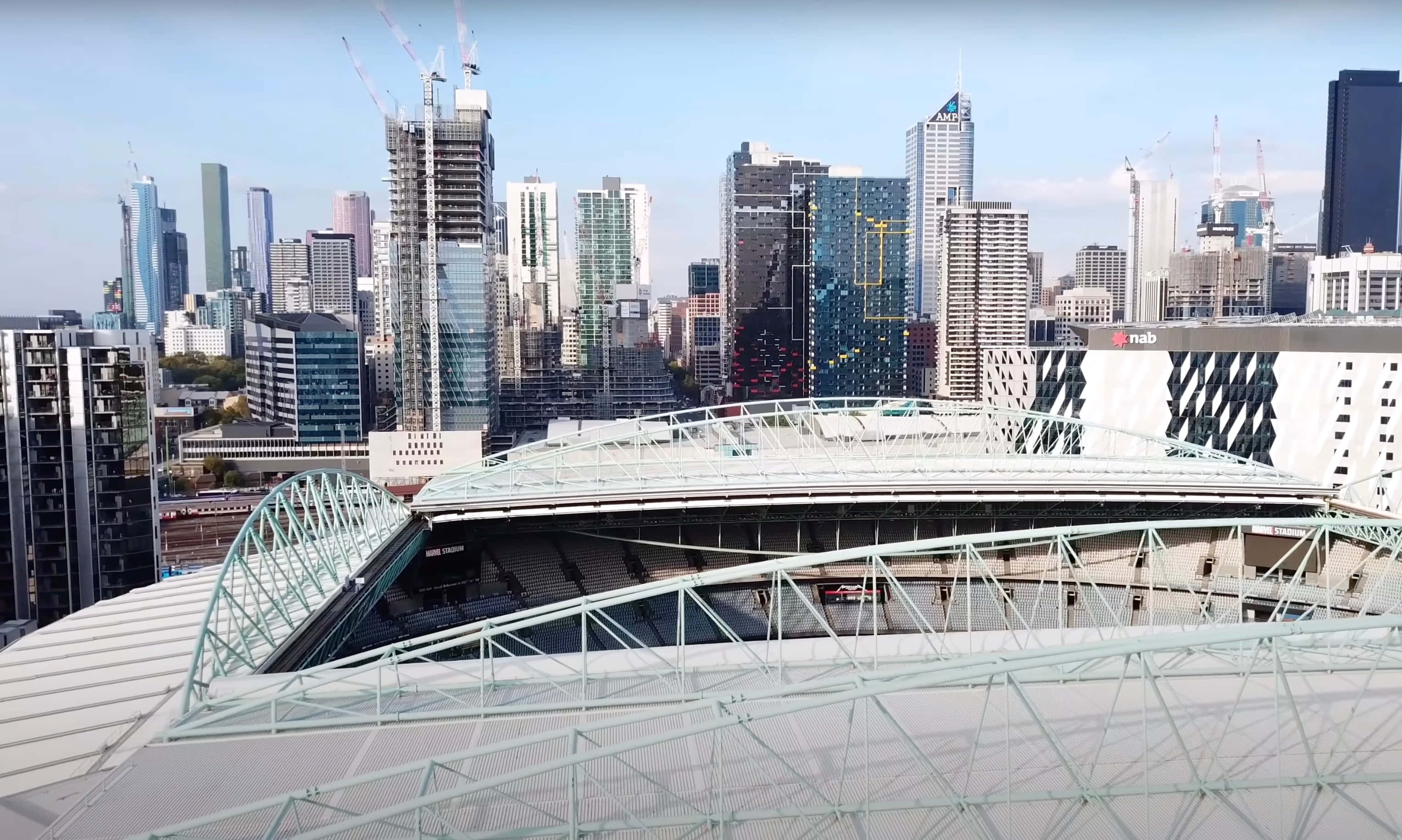 Melbourne Cricket Ground, city skyline, curved metal roof, 2K Desktop Wallpaper