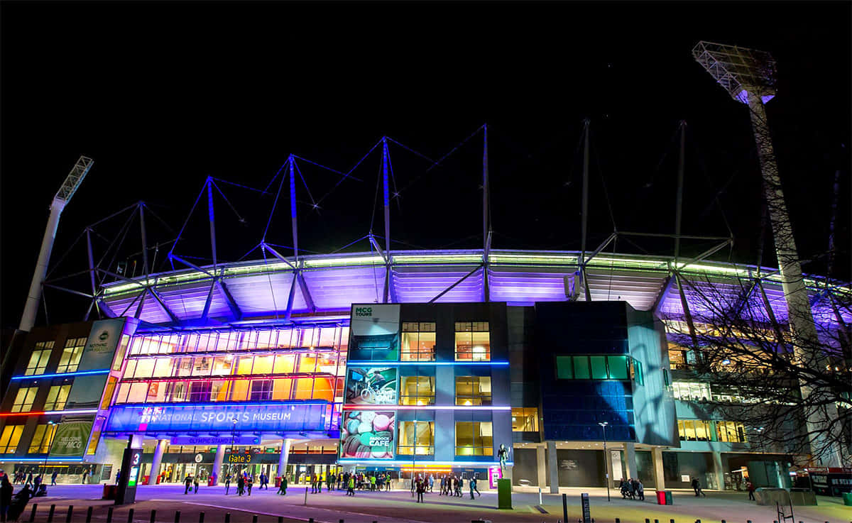 Melbourne Cricket Ground, night view, vibrant purple and blue lights, SD Desktop Wallpaper