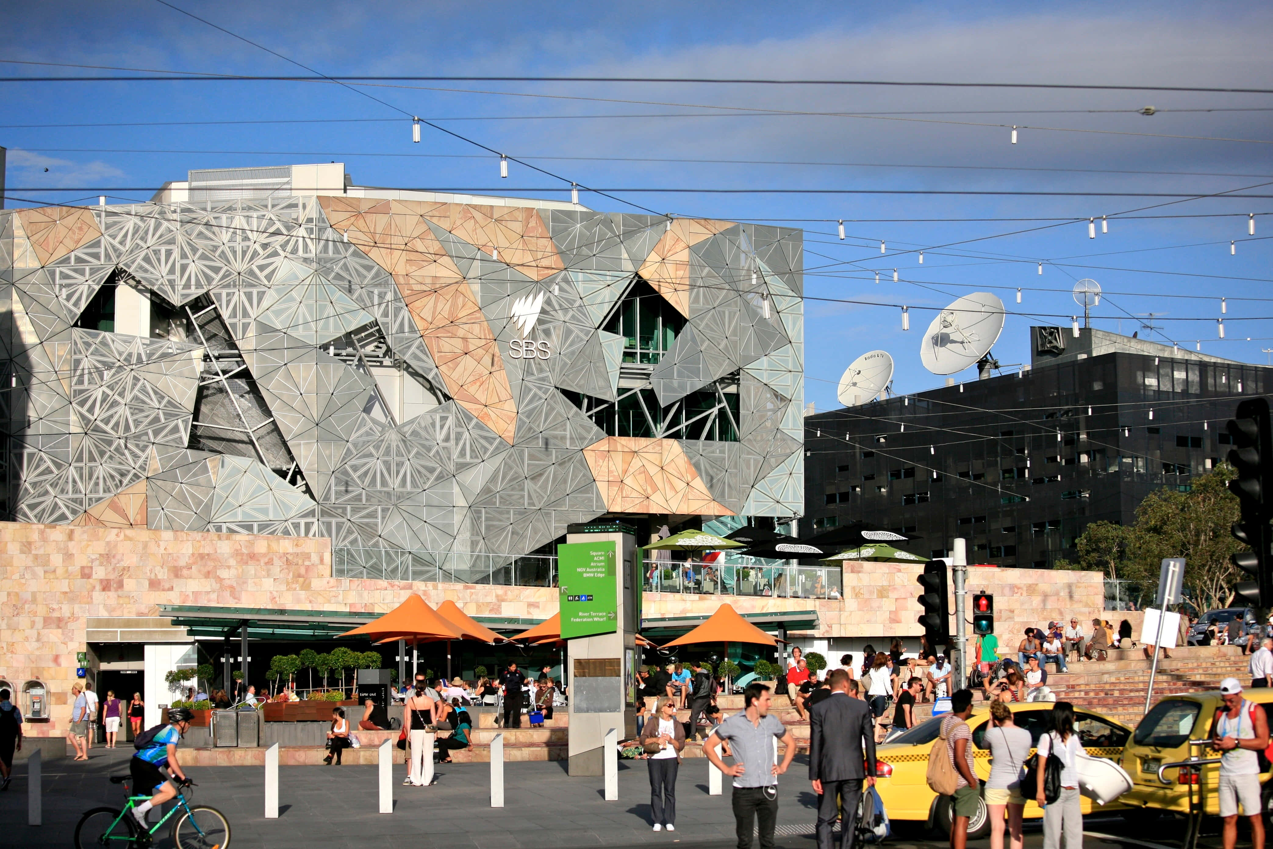 Melbourne Federation Square, angular, geometrically patterned facade, bright blue sky, 4K Desktop Wallpaper