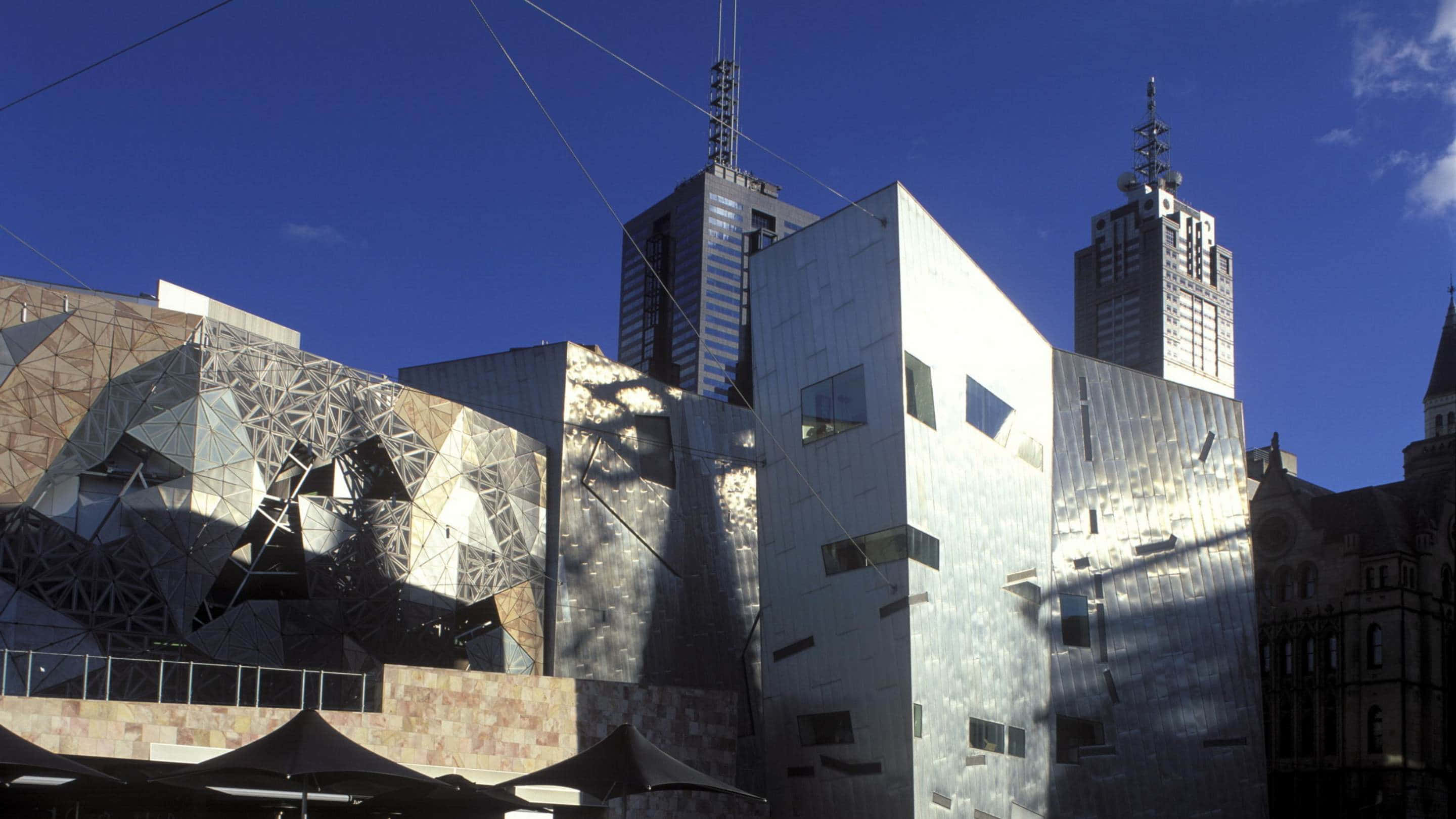 Melbourne Federation Square, modern metallic buildings, geometric facades, 2K Desktop Wallpaper