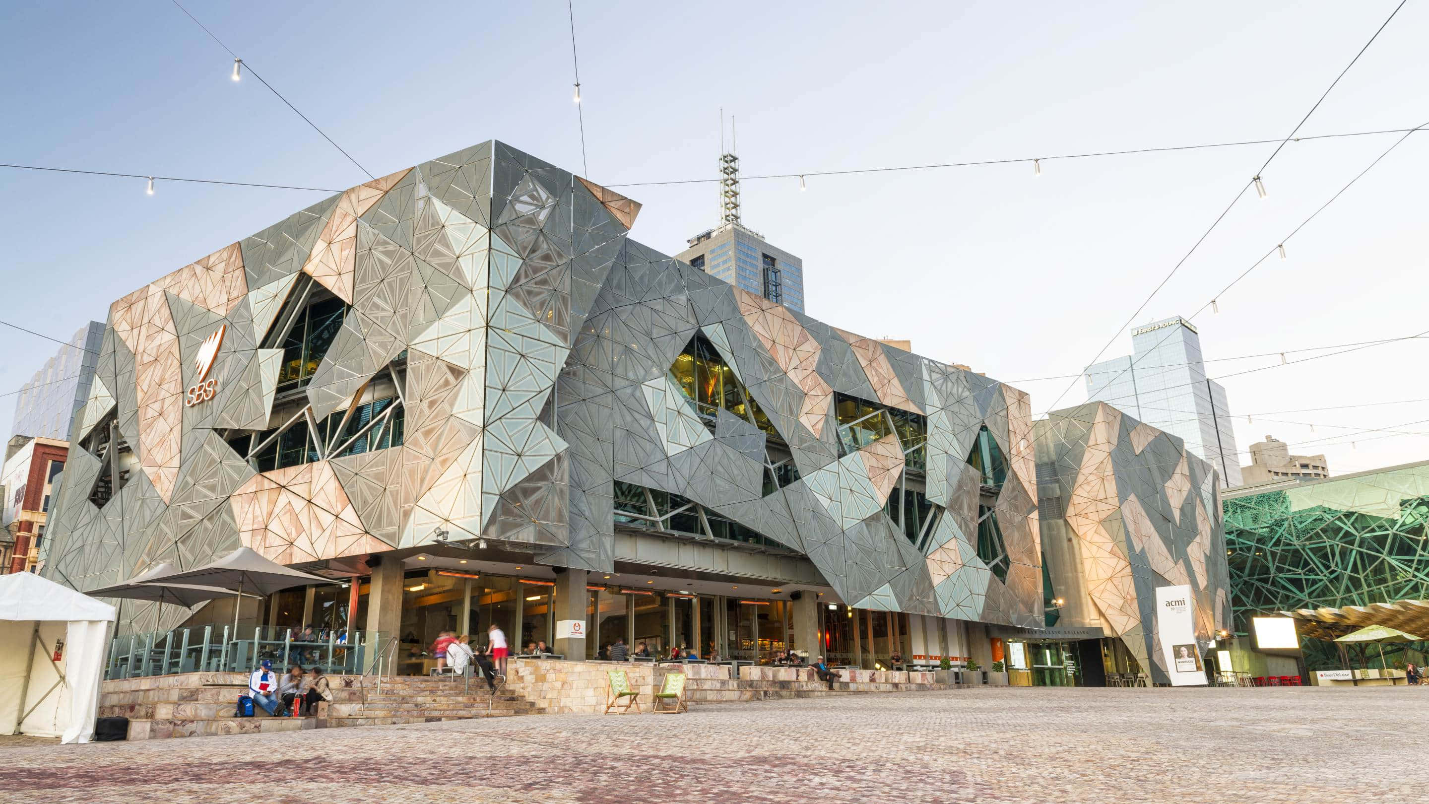 Melbourne Federation Square, faceted metallic exterior, sky, 2K Desktop Wallpaper