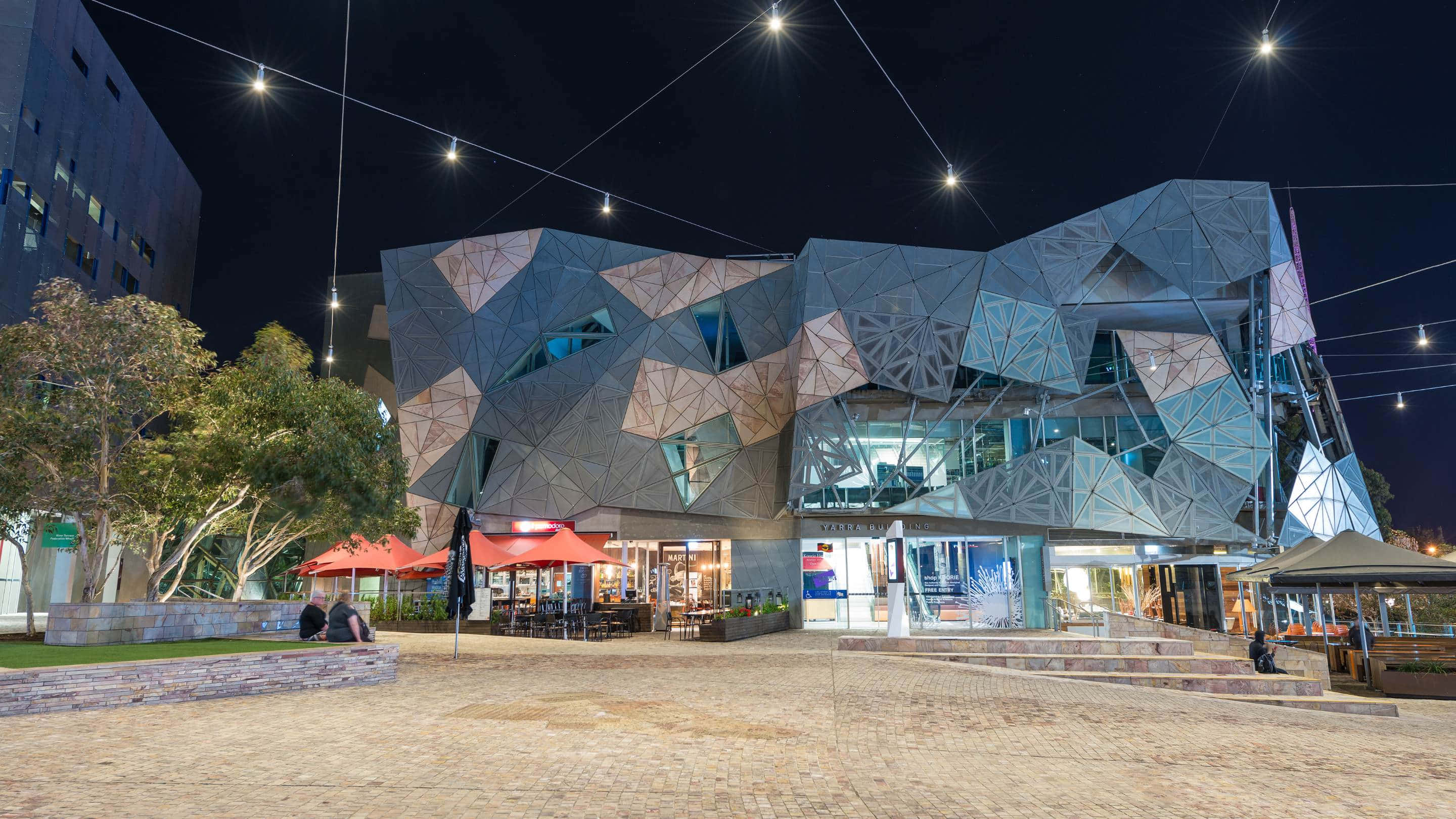 Melbourne Federation Square, nighttime, geometric glass and steel building, 2K Desktop Wallpaper