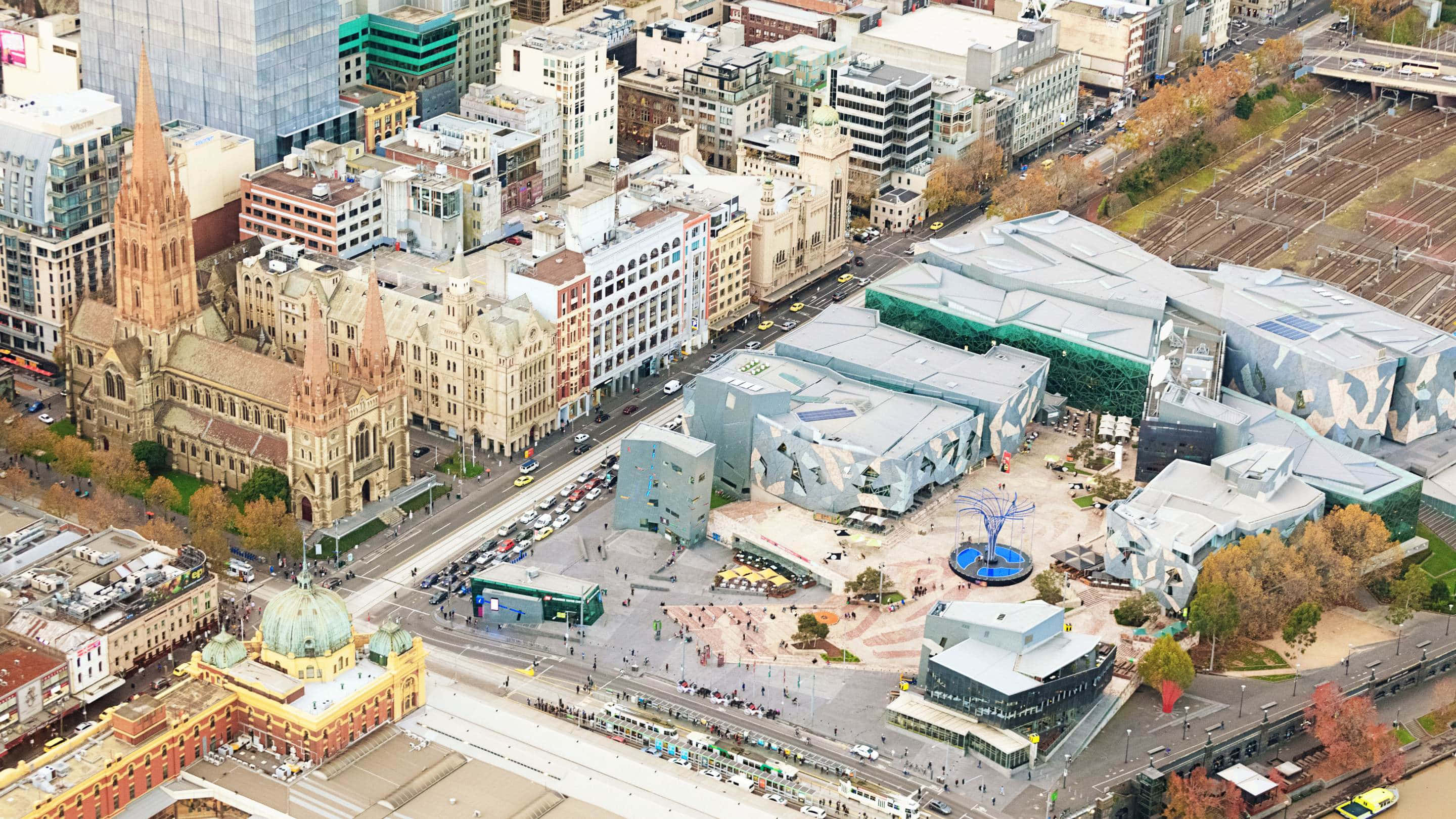 Melbourne Federation Square, historic sandstone church, modern glass architecture, 2K Desktop Wallpaper