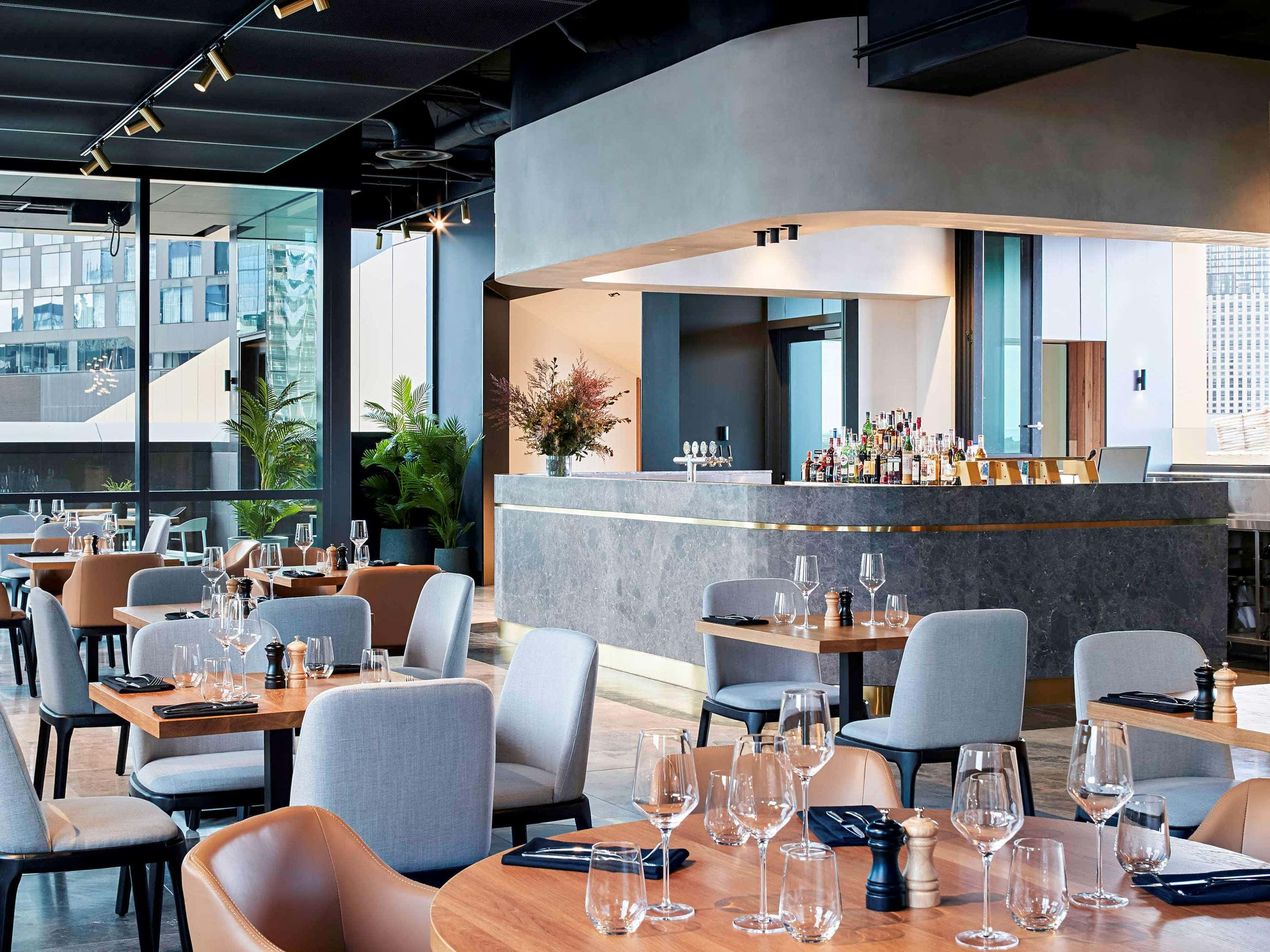 Melbourne South Wharf, rooftop restaurant, sleek tables, 2K Desktop Wallpaper
