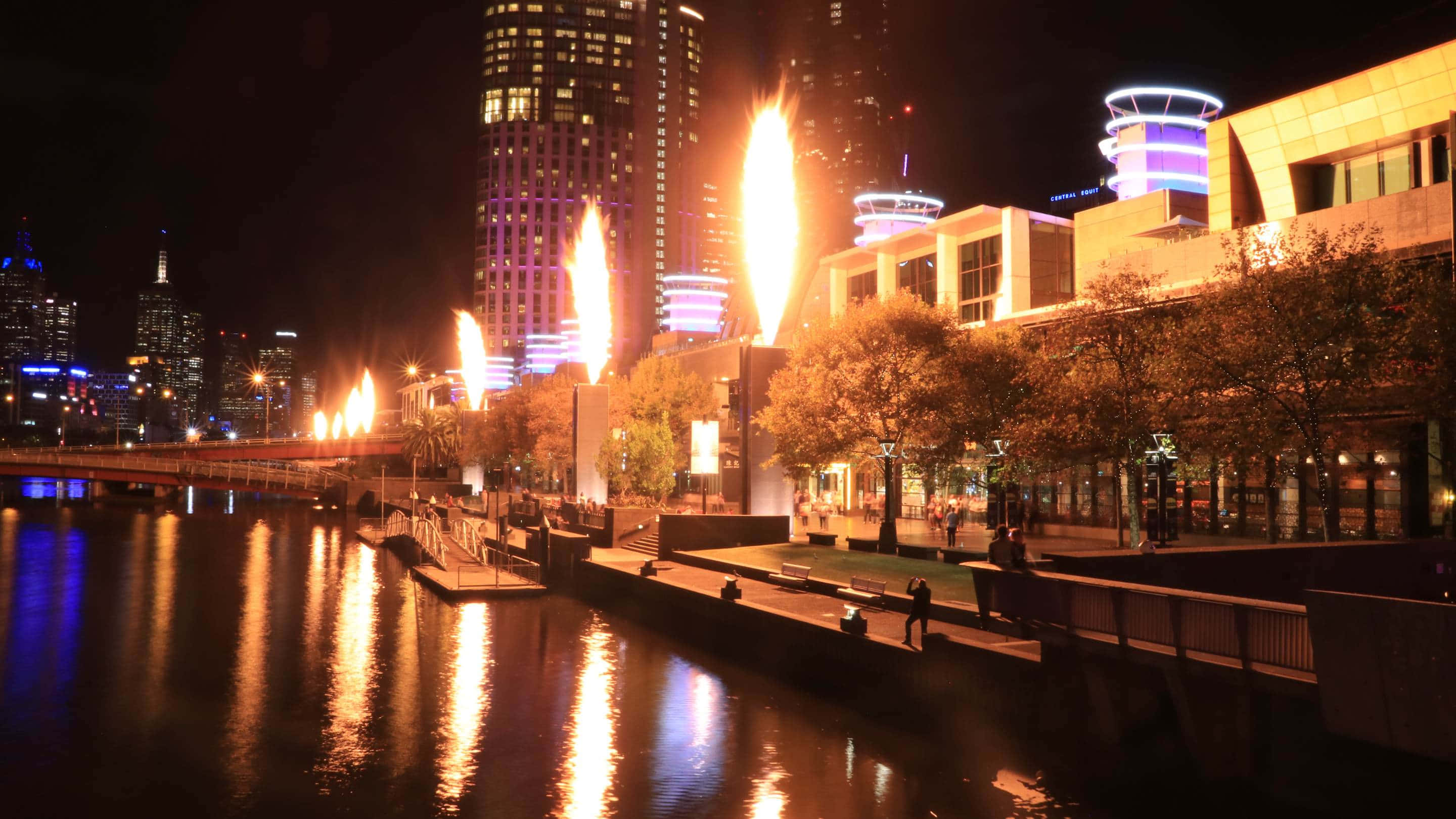 Melbourne South Wharf, nighttime, glowing orange flames, 2K Desktop Wallpaper
