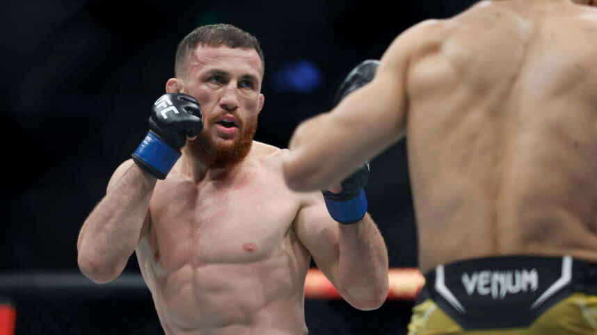 Merab Dvalishvili, blue gloves, dimly lit octagon, SD Desktop Wallpaper