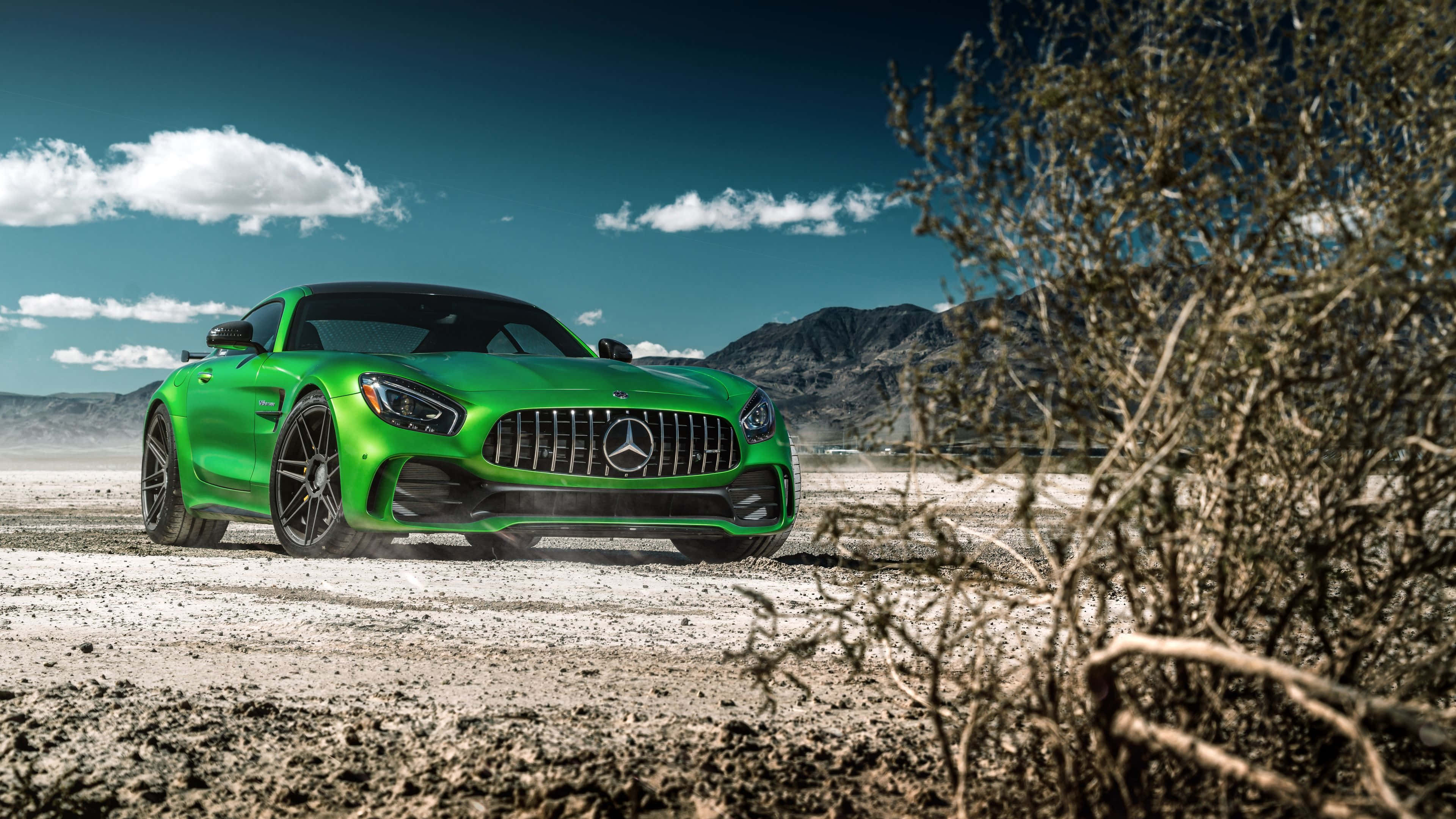 Mercedes-AMG GT, vibrant green, dusty desert road, 4K Desktop Wallpaper