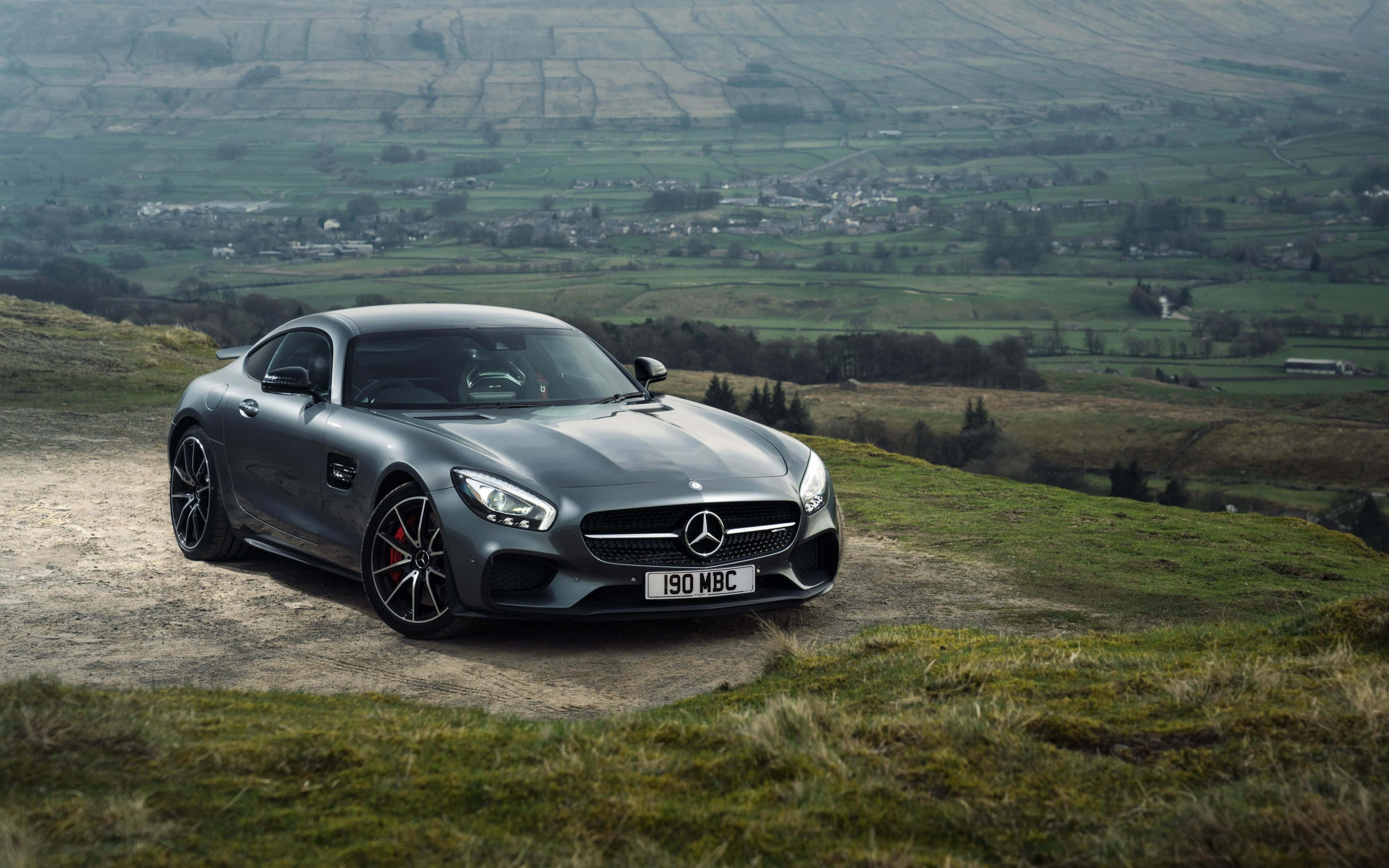 Mercedes-AMG GT, gray, grassy hill, 4K Desktop Wallpaper