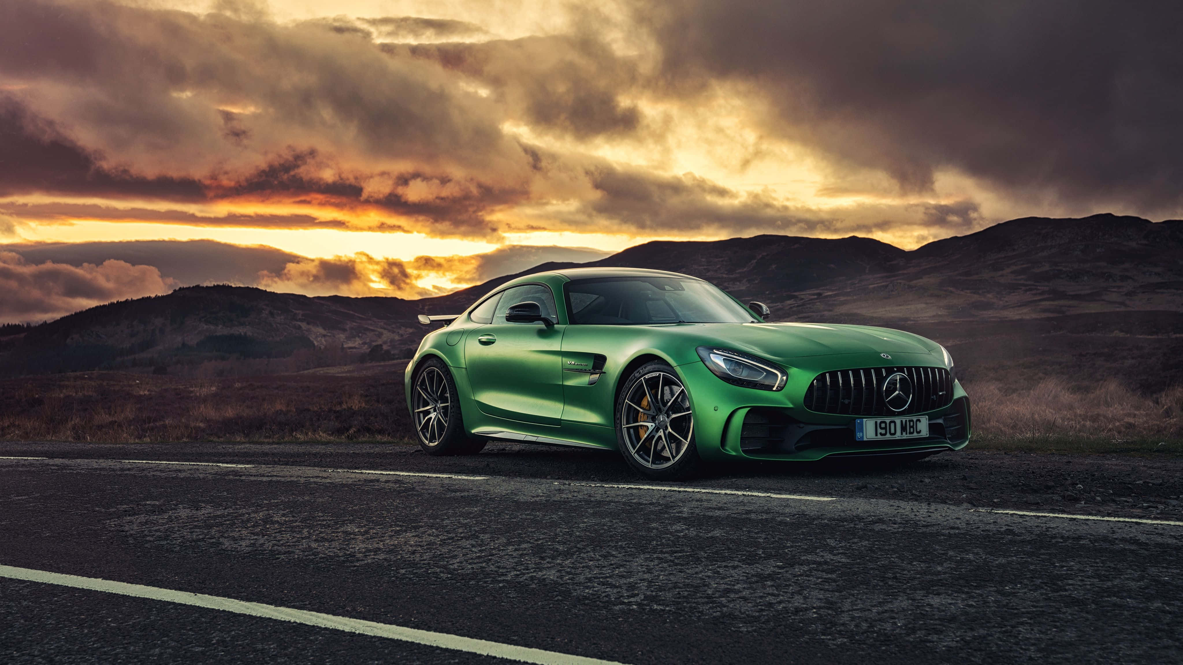 Mercedes-AMG GT, vibrant green, mountain road, 4K Desktop Wallpaper