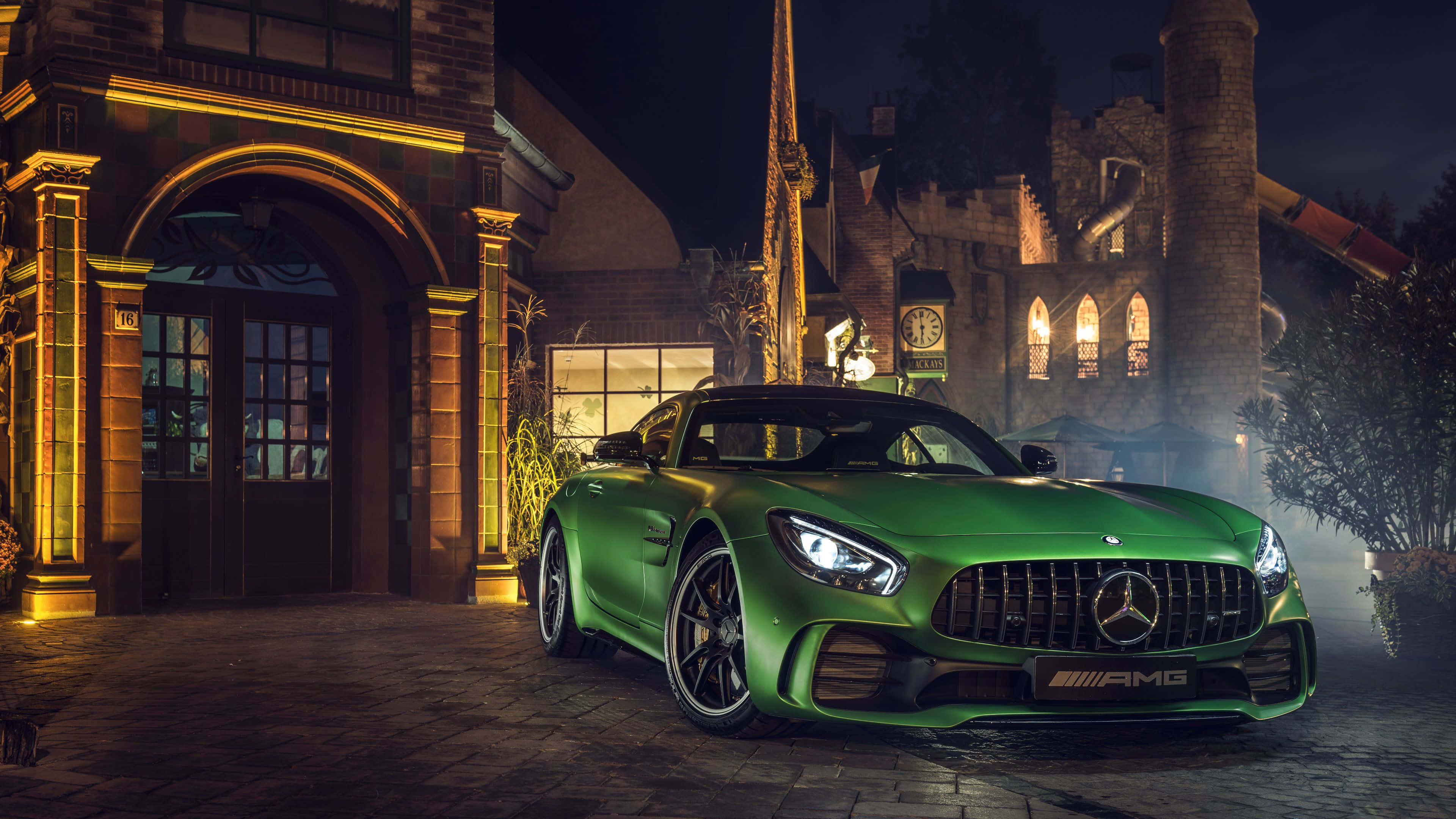 Mercedes AMG GT, vibrant green, warm night lights, 4K Desktop Wallpaper