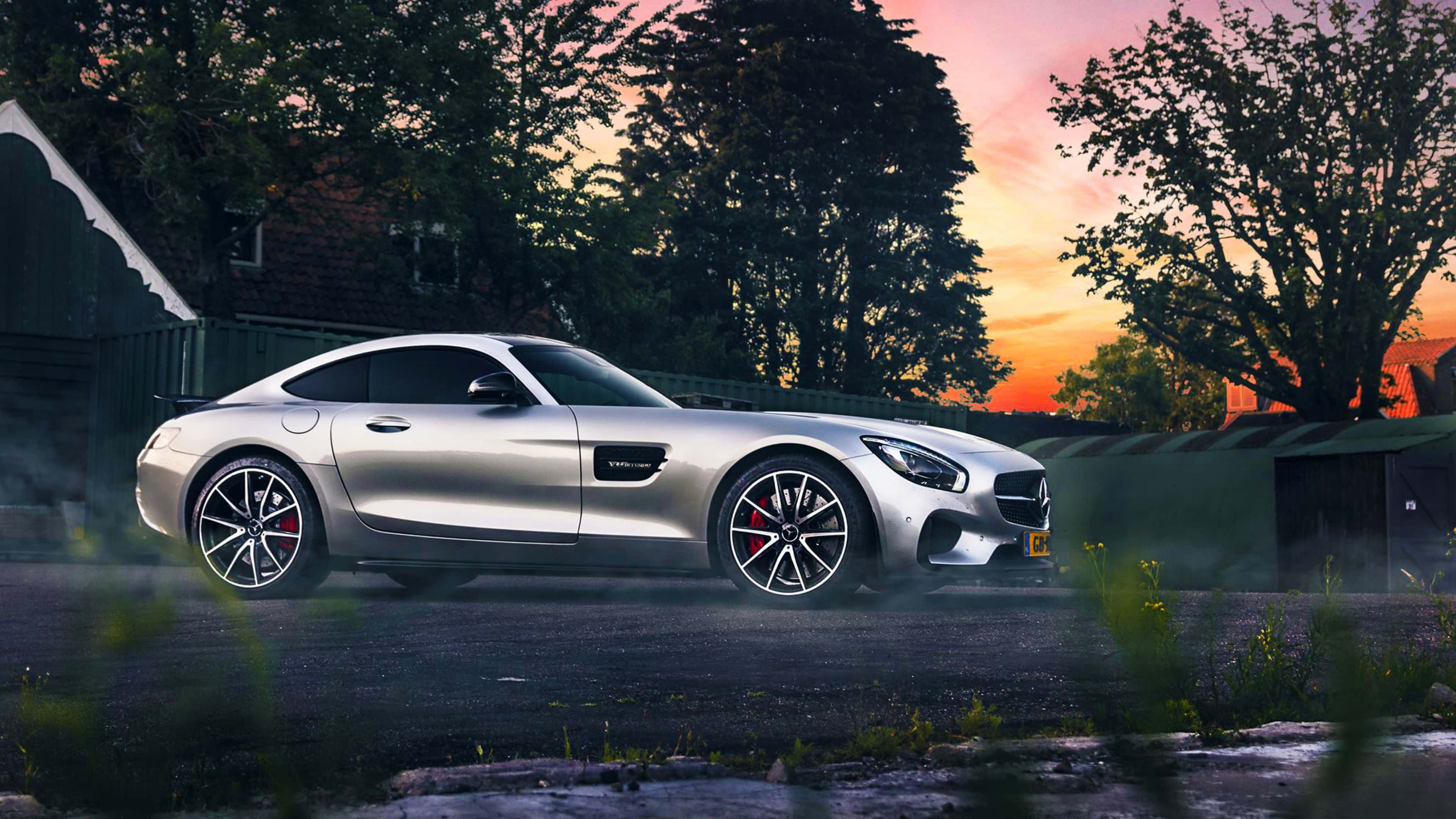 Mercedes AMG GT, sleek silver sports car, misty driveway, 4K Desktop Wallpaper