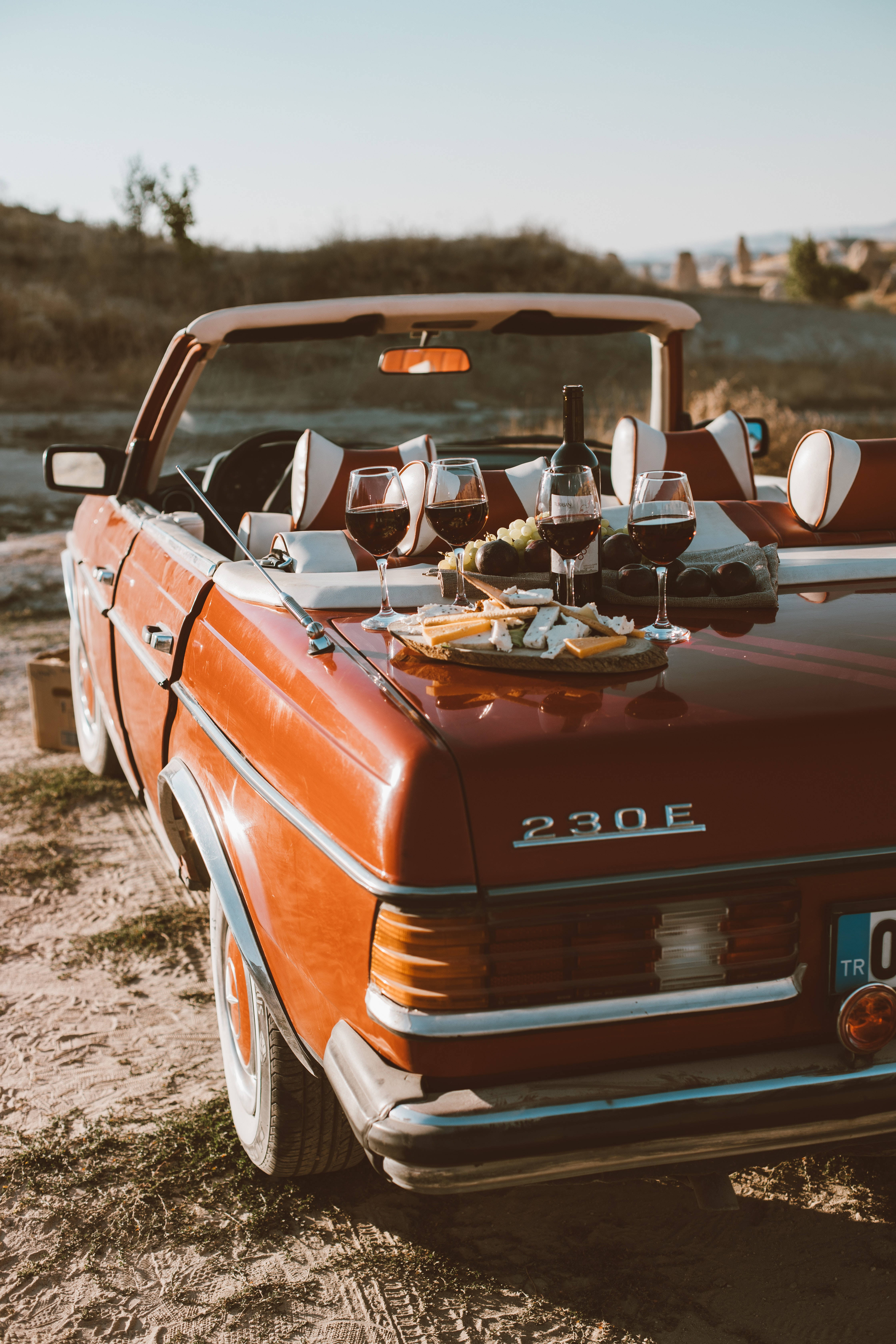 Mercedes AMG, vintage orange convertible, sunlit desert, 5K Phone Wallpaper