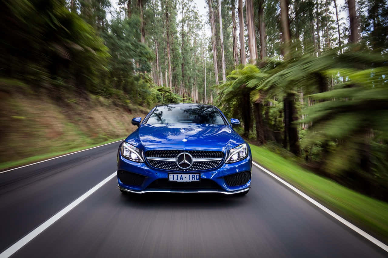 Mercedes Benz C-Class, vibrant blue, winding forest road, HD Desktop Wallpaper