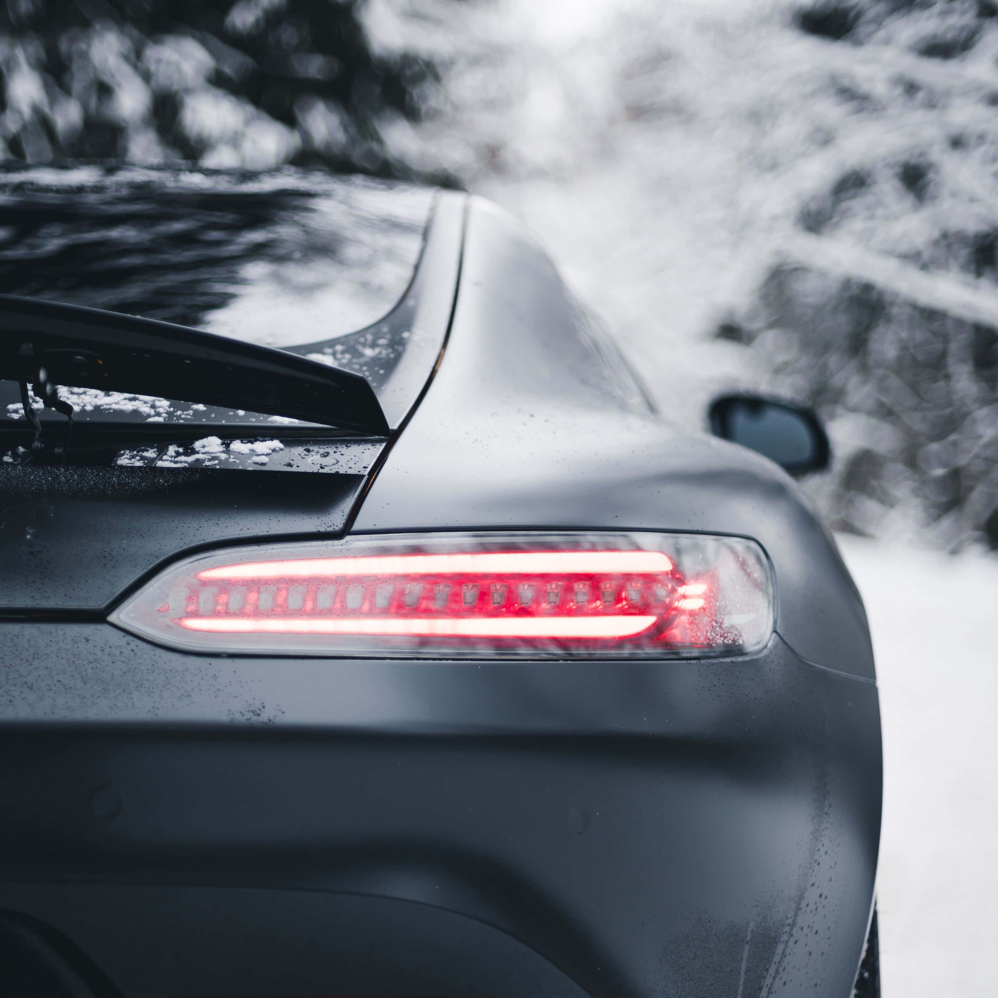 Mercedes, matte black, glowing red taillight, 2K Desktop Wallpaper