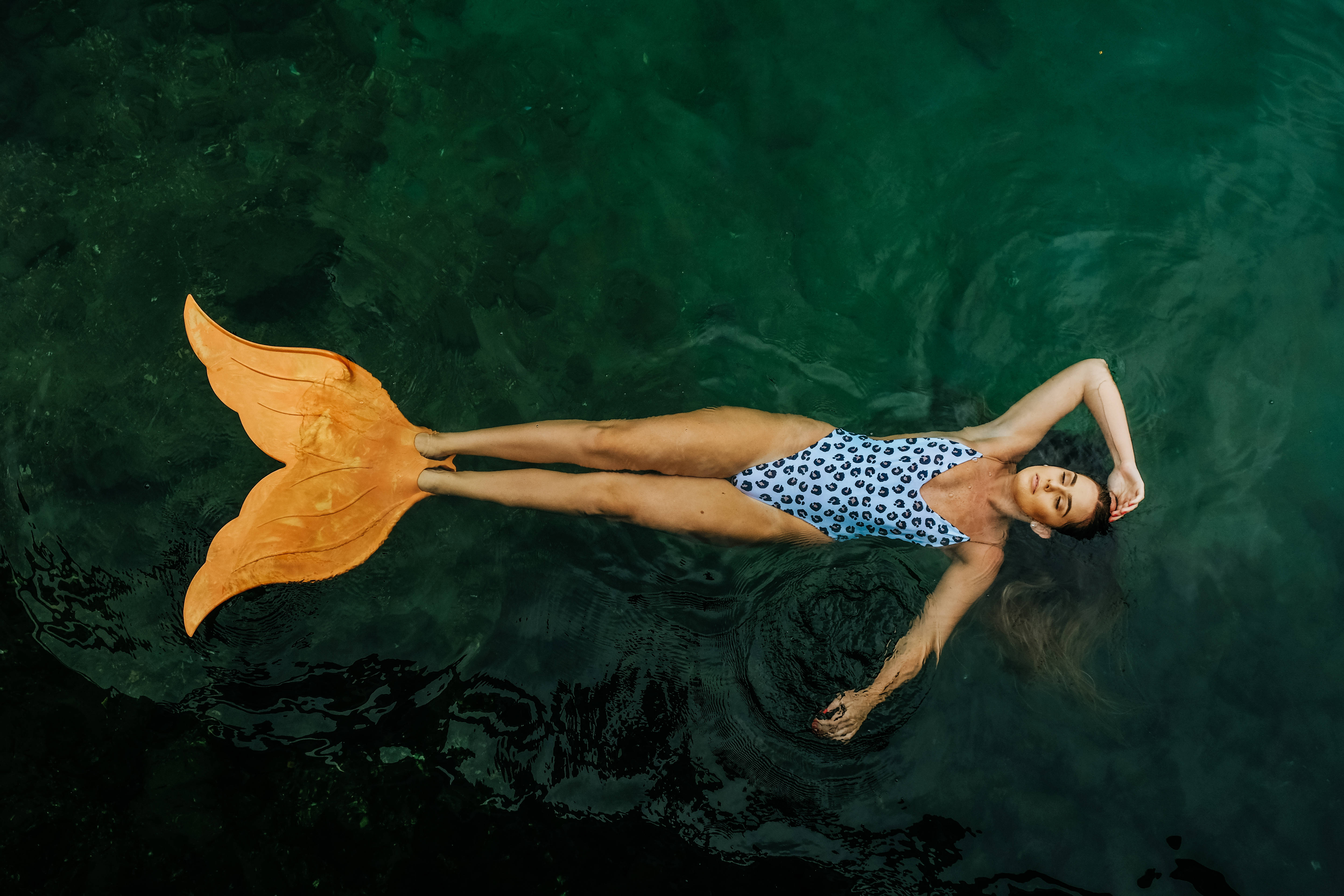 woman mermaid, bright orange mermaid tail, deep green water, 5K Desktop Wallpaper
