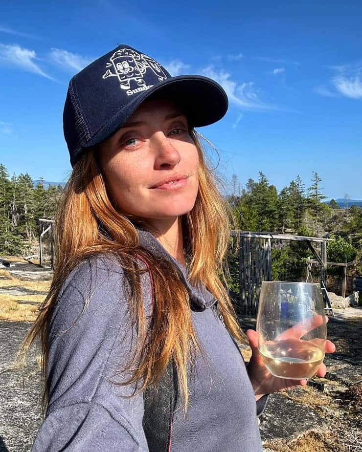 Merritt Patterson, navy cap, white wine, SD Phone Wallpaper