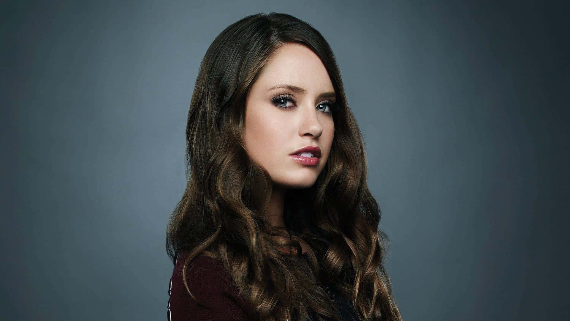Merritt Patterson, long wavy brown hair, muted gray studio backdrop, Full HD Desktop Wallpaper