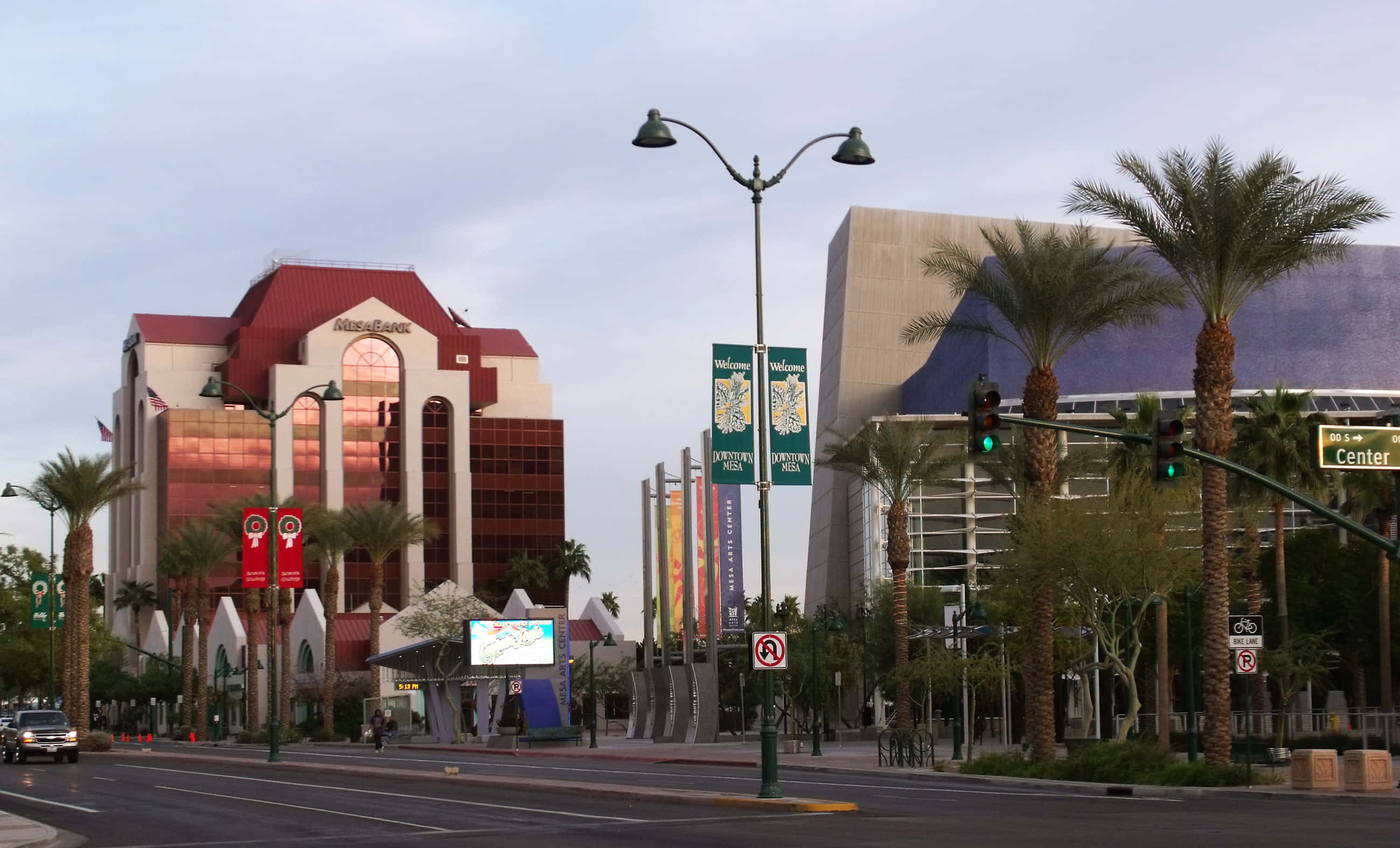 serene sunset, mesa landscape, city street scene, 2K Desktop Wallpaper