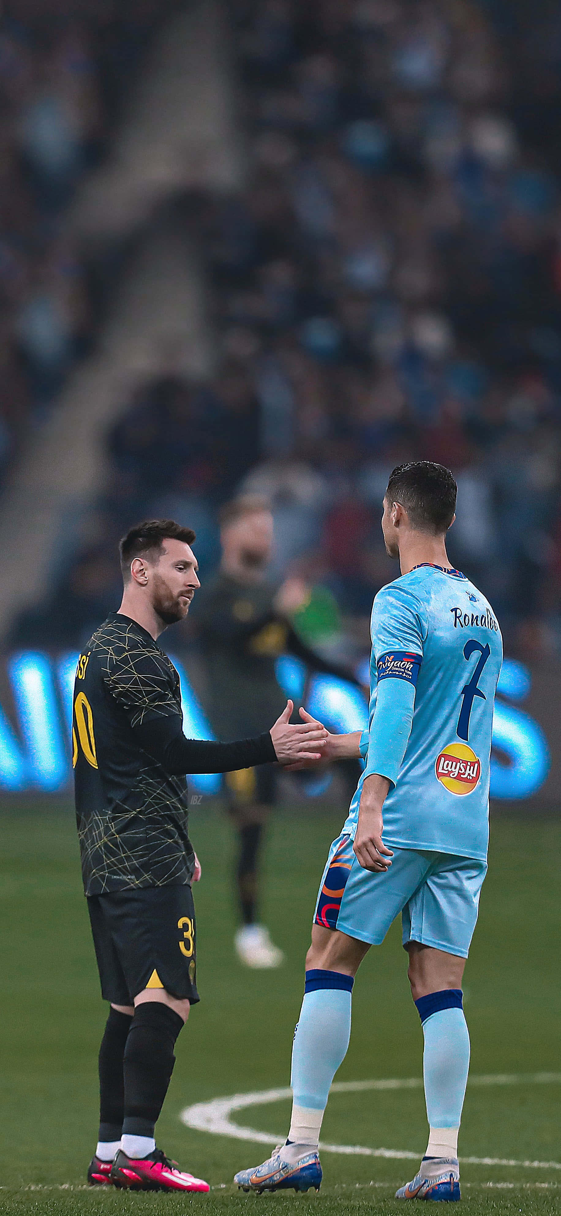 Messi And Ronaldo, vibrant green pitch, stadium lights, 4K Phone Wallpaper