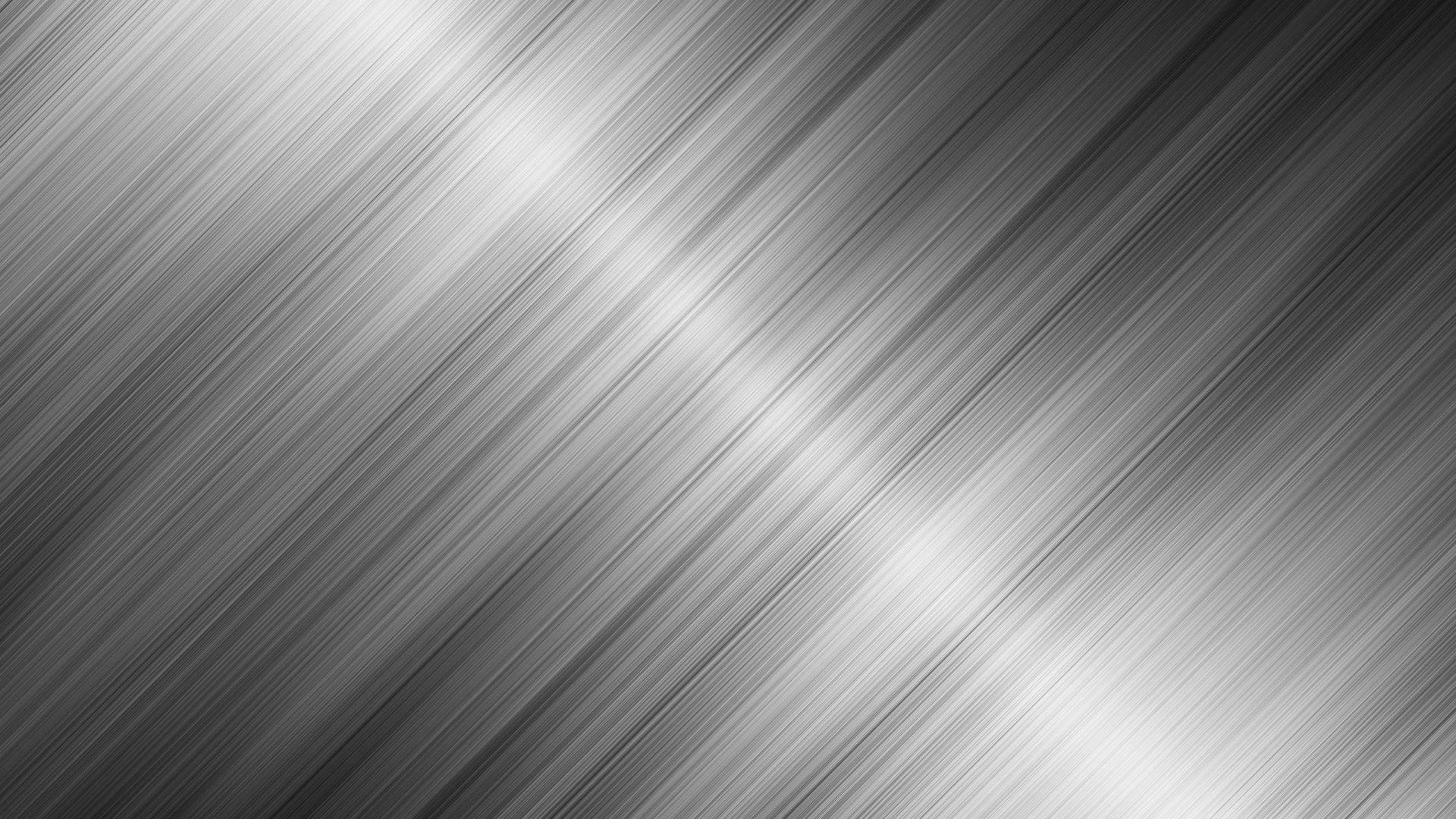 diagonal brushed metal texture, gradient gray tones, soft highlights, Full HD Desktop Wallpaper