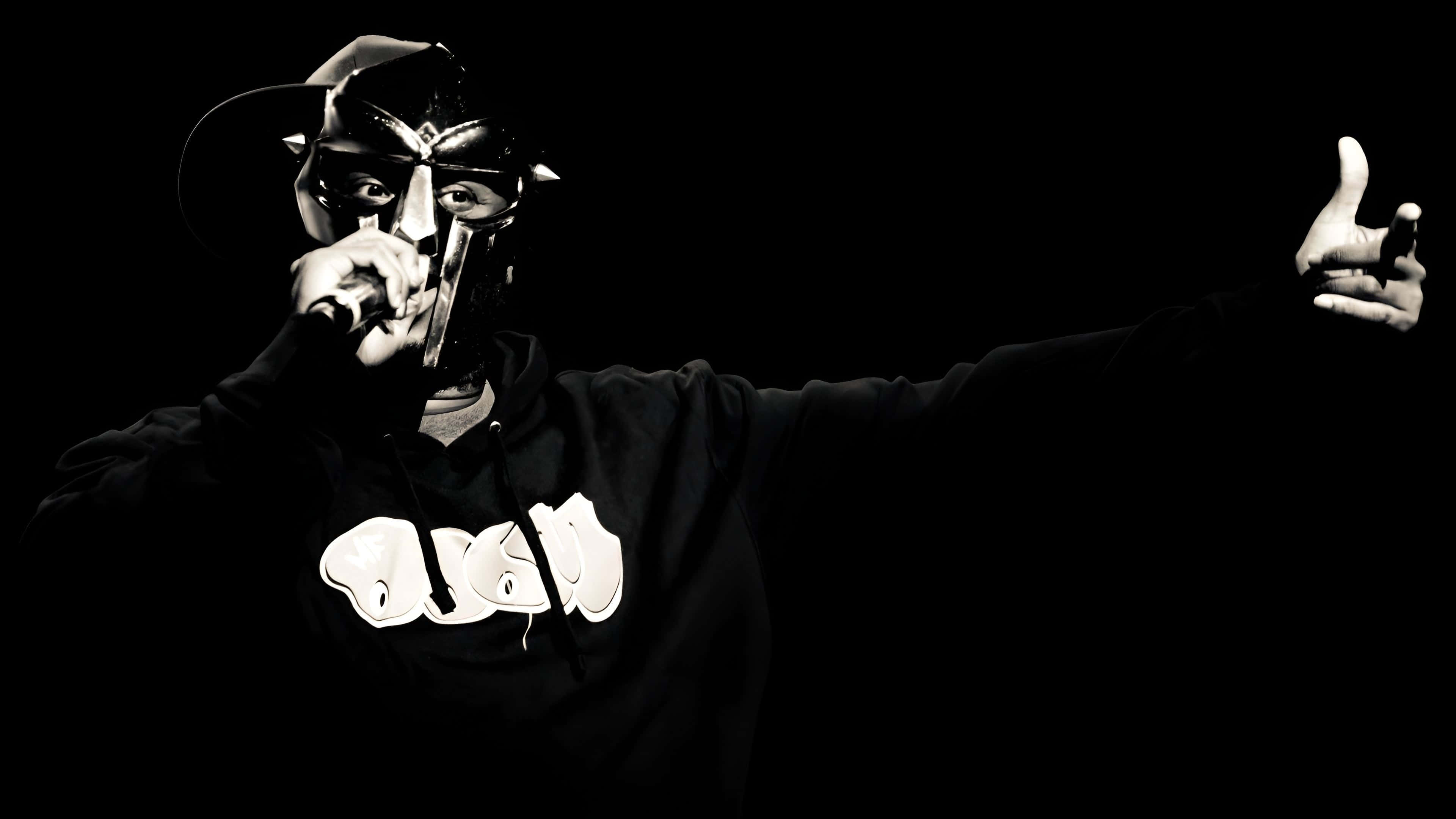 M F Doom, black hoodie, white graffiti-style lettering, 4K Desktop Wallpaper
