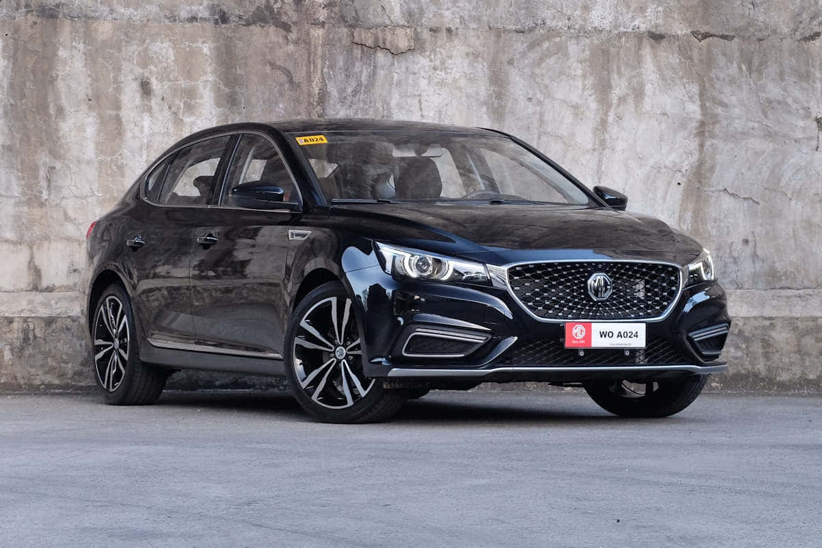 black MG sedan, chrome accents, alloy wheels, SD Desktop Wallpaper