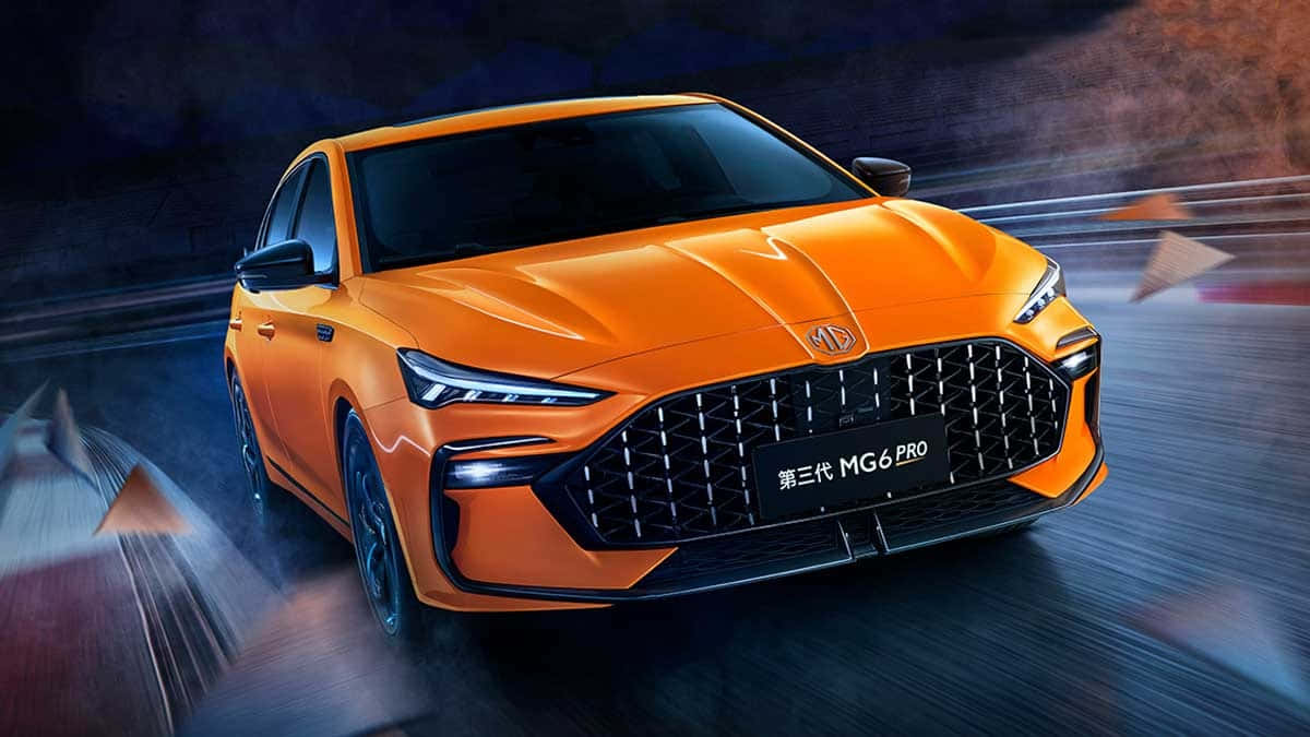 orange MG6 PRO, motion blur streaks, dark atmospheric background, SD Desktop Wallpaper