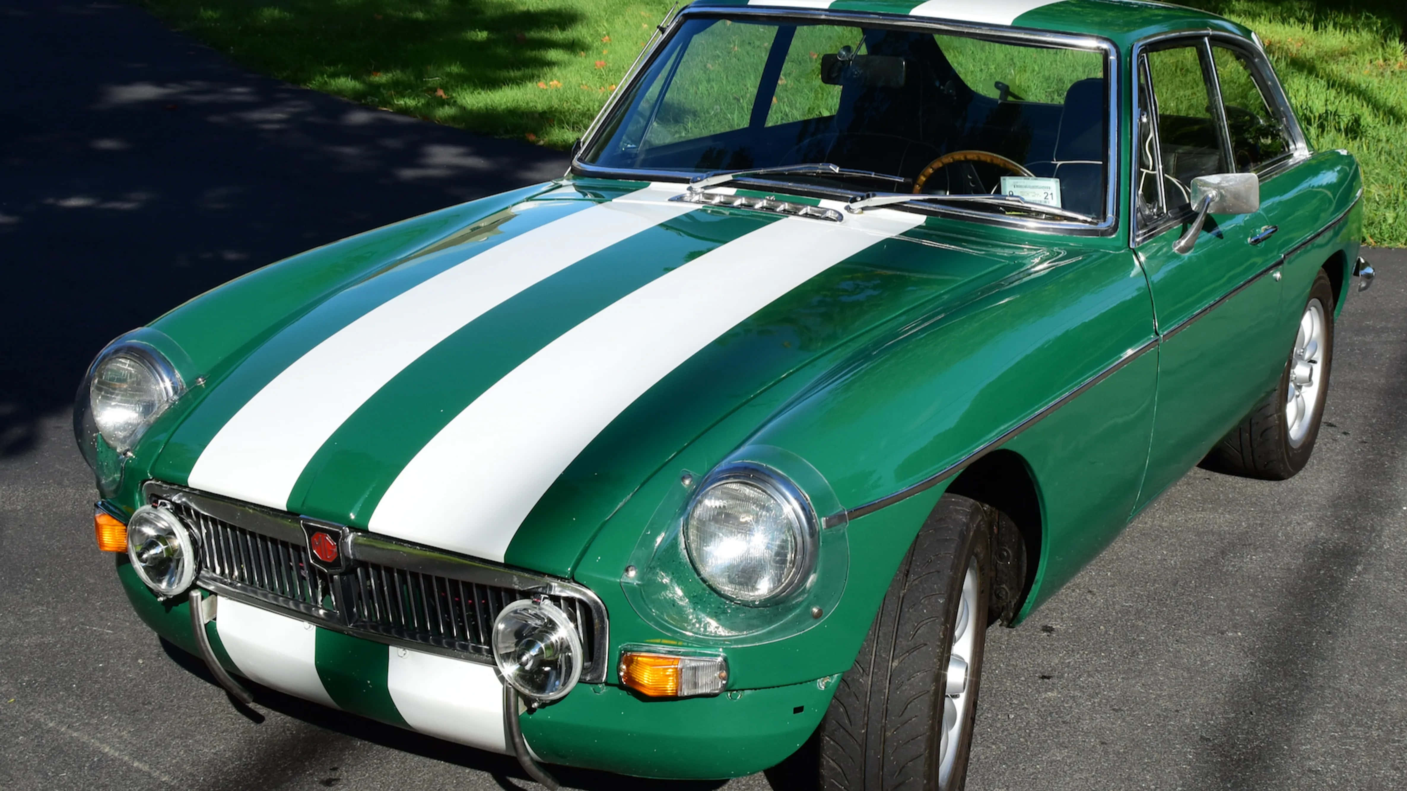 MG GT, vibrant green, bold white racing stripes, 4K Desktop Wallpaper