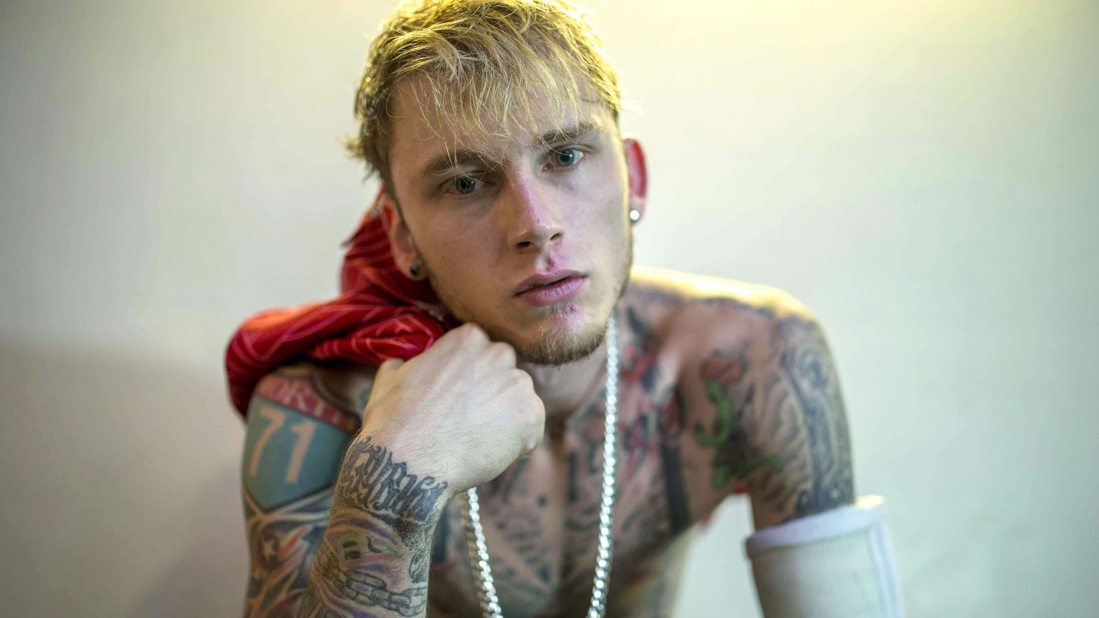 MGK, tattooed young man, blonde hair, 4K Desktop Wallpaper
