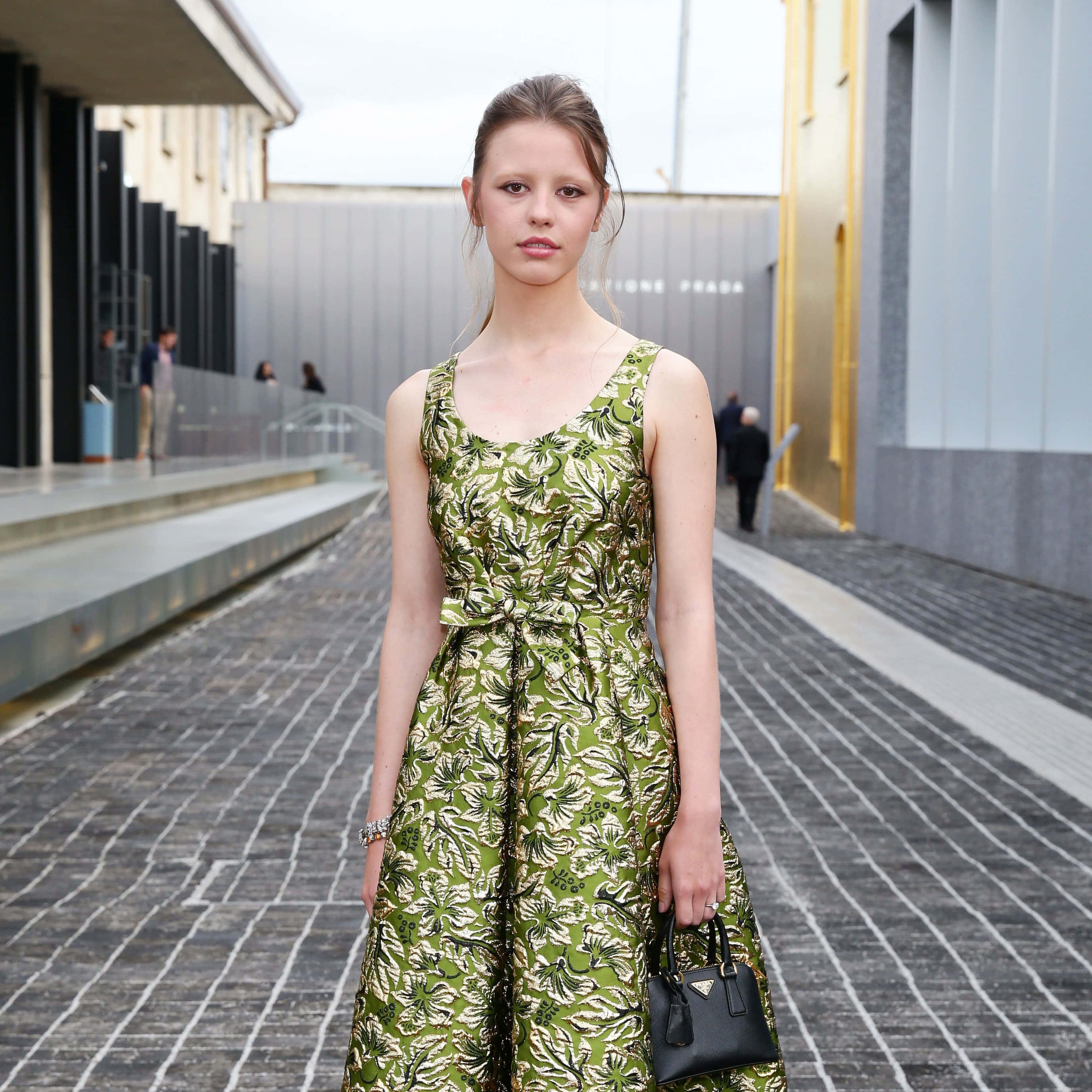 Mia Goth, green floral dress, urban walkway, 2K Desktop Wallpaper