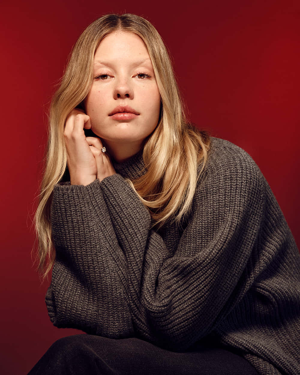 Mia Goth, blonde hair, chunky gray sweater, SD Phone Wallpaper