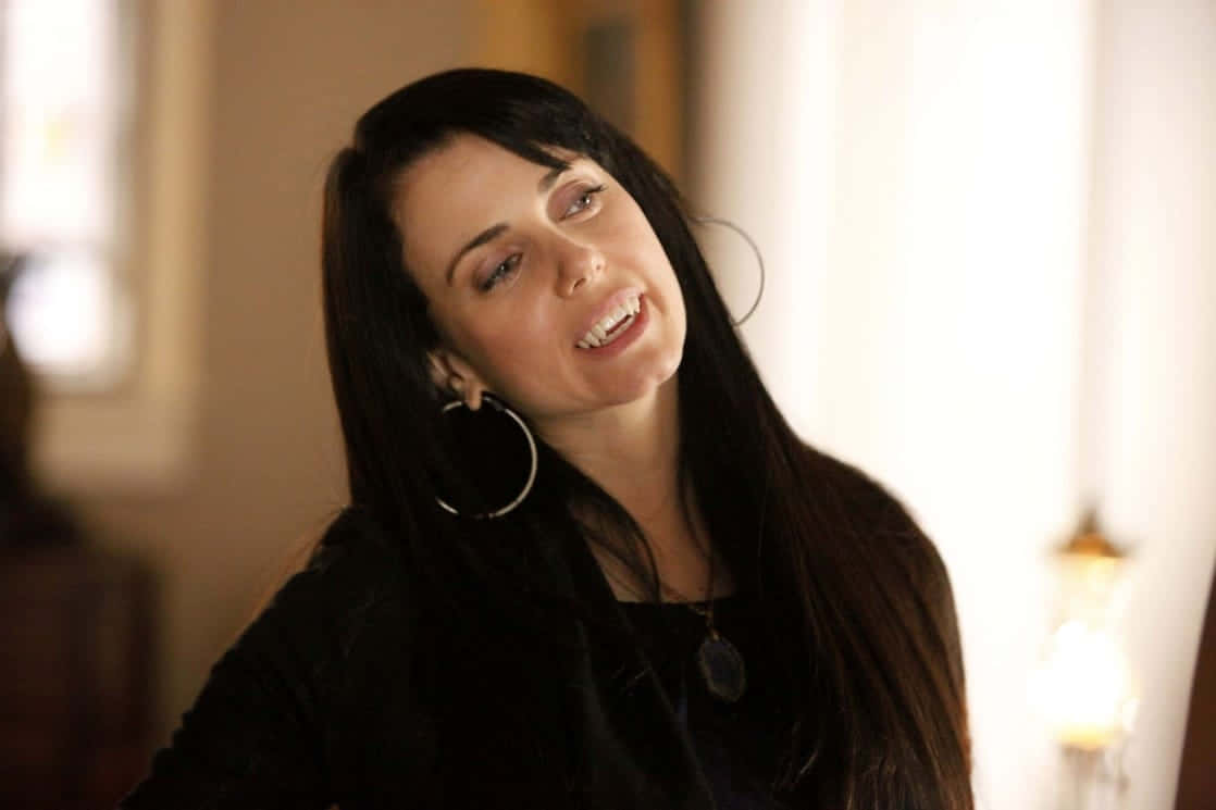 Mia Kirshner, long dark hair, large hoop earrings, SD Desktop Wallpaper