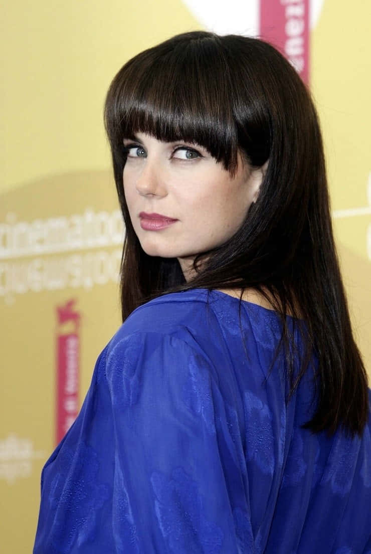 Mia Kirshner, blue dress, royal blue blouse, SD Phone Wallpaper