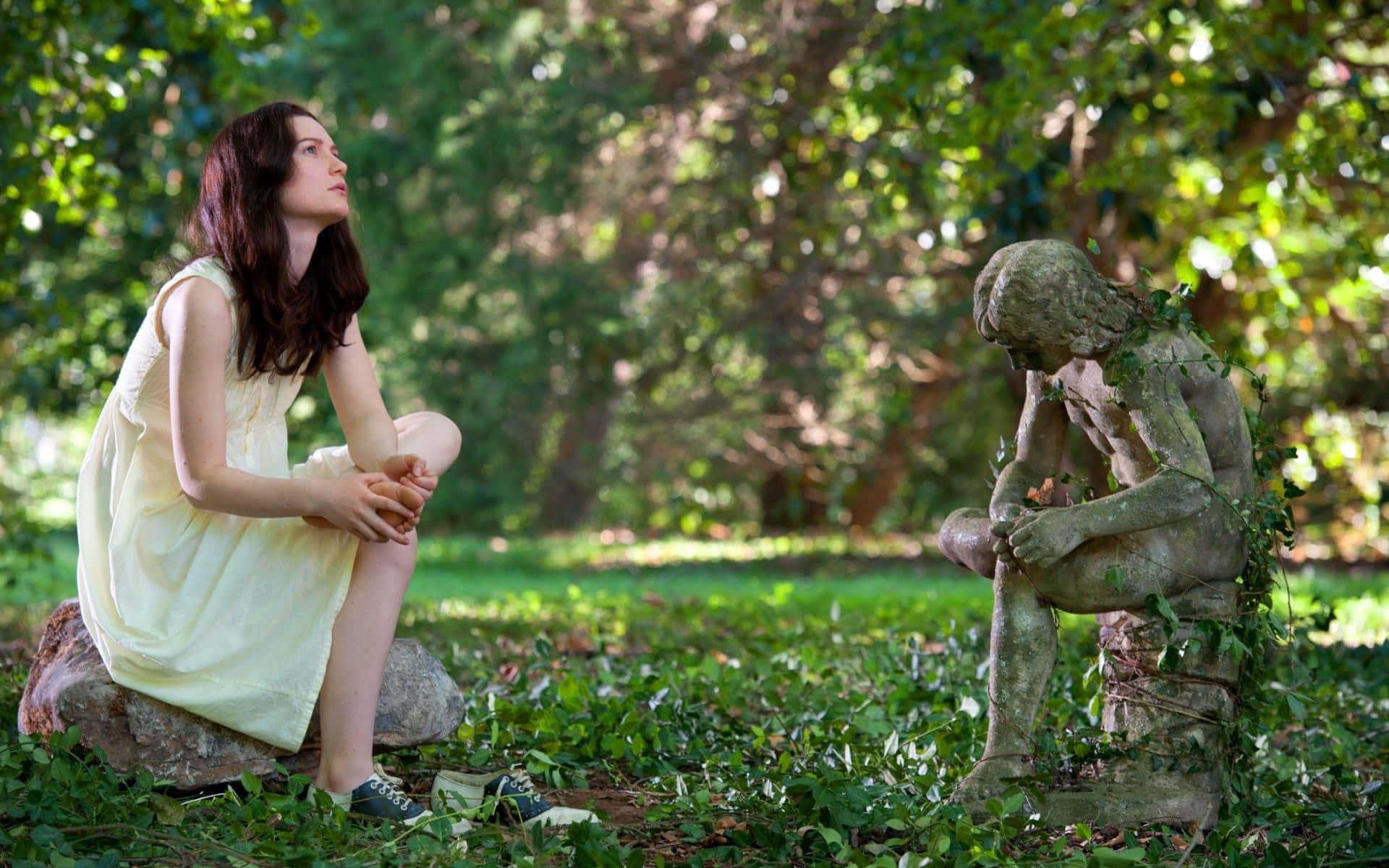 Mia Wasikowska, pale yellow dress, moss-covered stone statue, Full HD Desktop Wallpaper