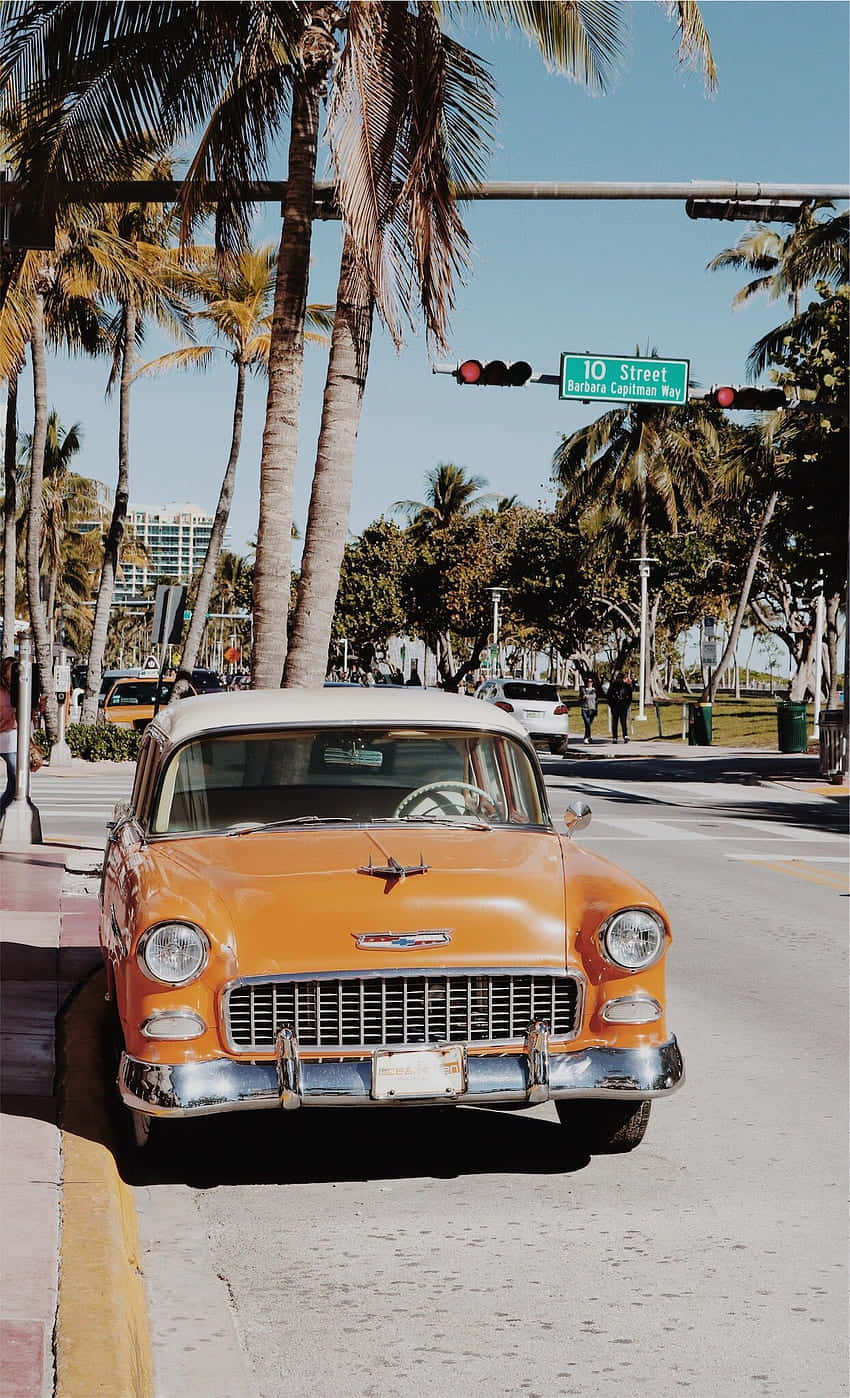 Miami Beach, vintage orange Chevrolet Bel Air, palm-lined street, HD Phone Wallpaper