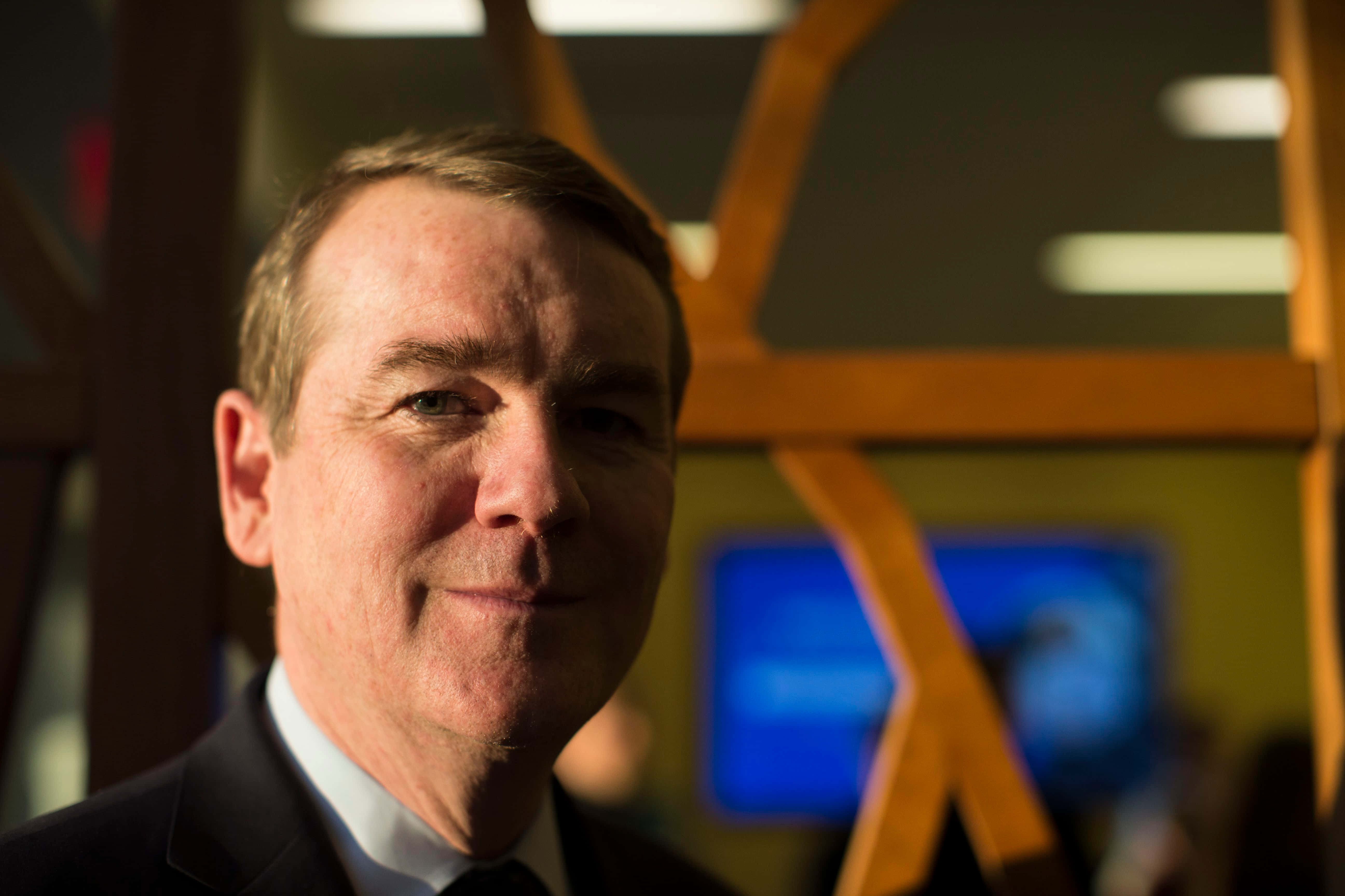 Michael Bennet, suit, soft indoor lighting, 5K Desktop Wallpaper