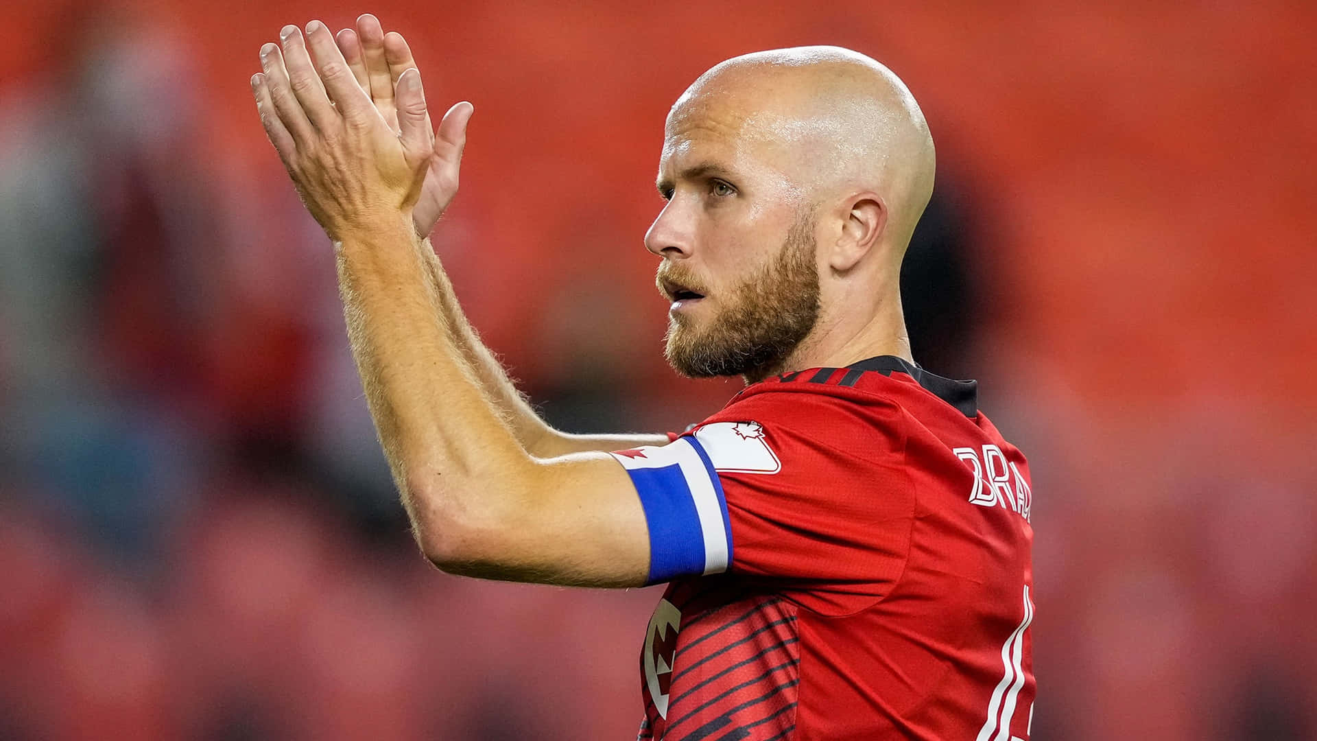 Michael Bradley, red jersey, stadium field, Full HD Desktop Wallpaper