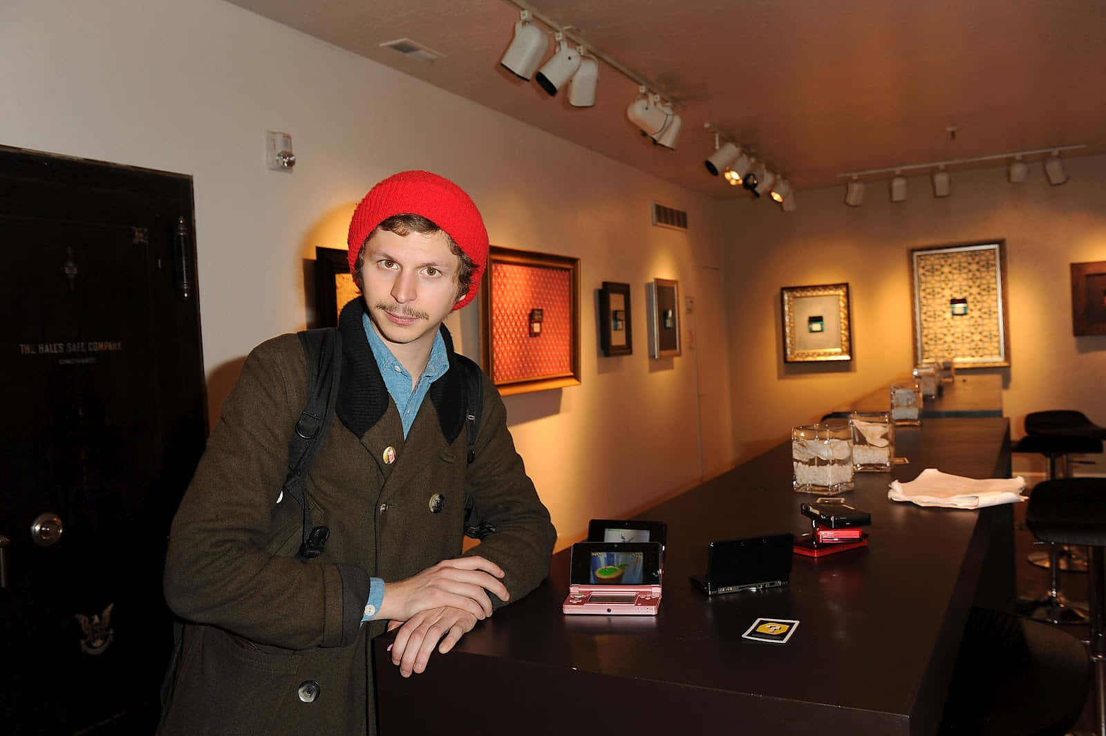 Michael Cera, red beanie, brown coat, HD Desktop Wallpaper
