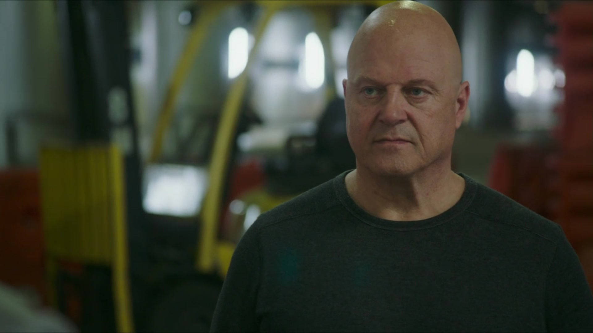 Michael Chiklis, dark shirt, dimly lit industrial warehouse, Full HD Desktop Wallpaper
