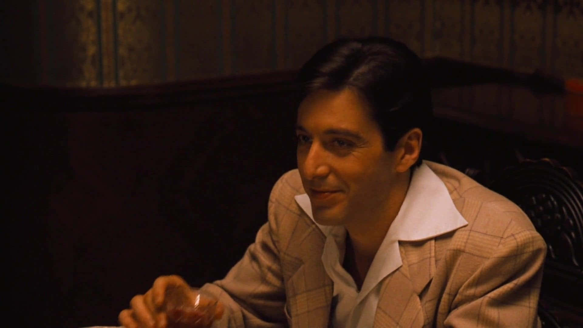 Michael Corleone, checkered suit, dimly lit vintage room, Full HD Desktop Wallpaper