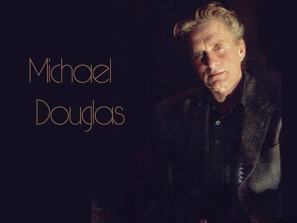 Michael Douglas, dimly lit portrait, warm text overlay, SD Desktop Wallpaper