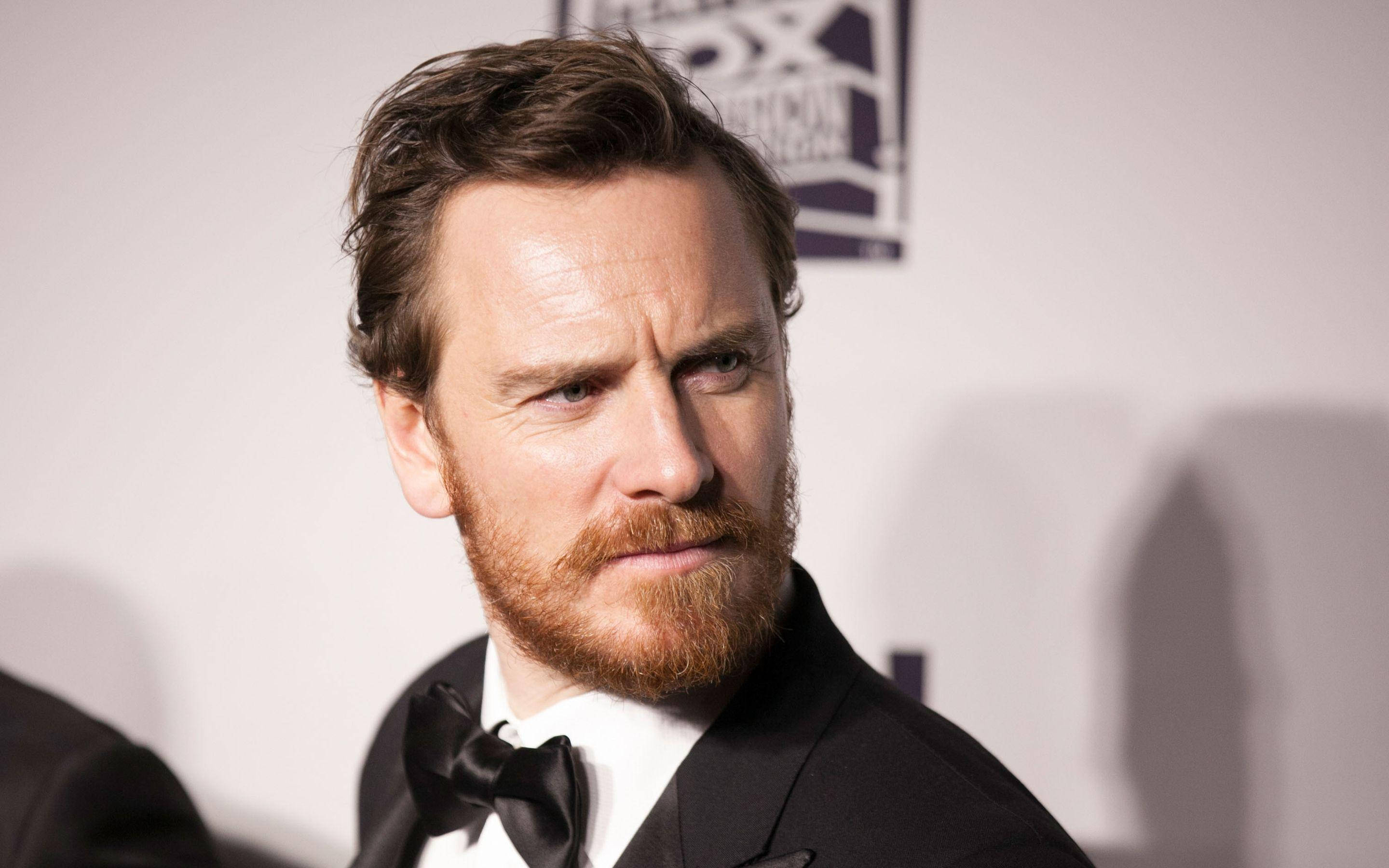Michael Fassbender, red beard, black tuxedo, 2K Desktop Wallpaper