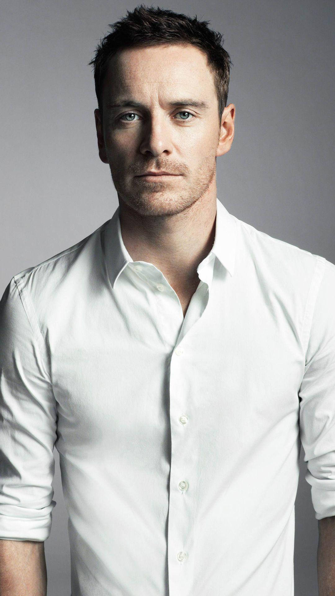 Michael Fassbender, intense blue eyes, short dark hair, Full HD Phone Wallpaper