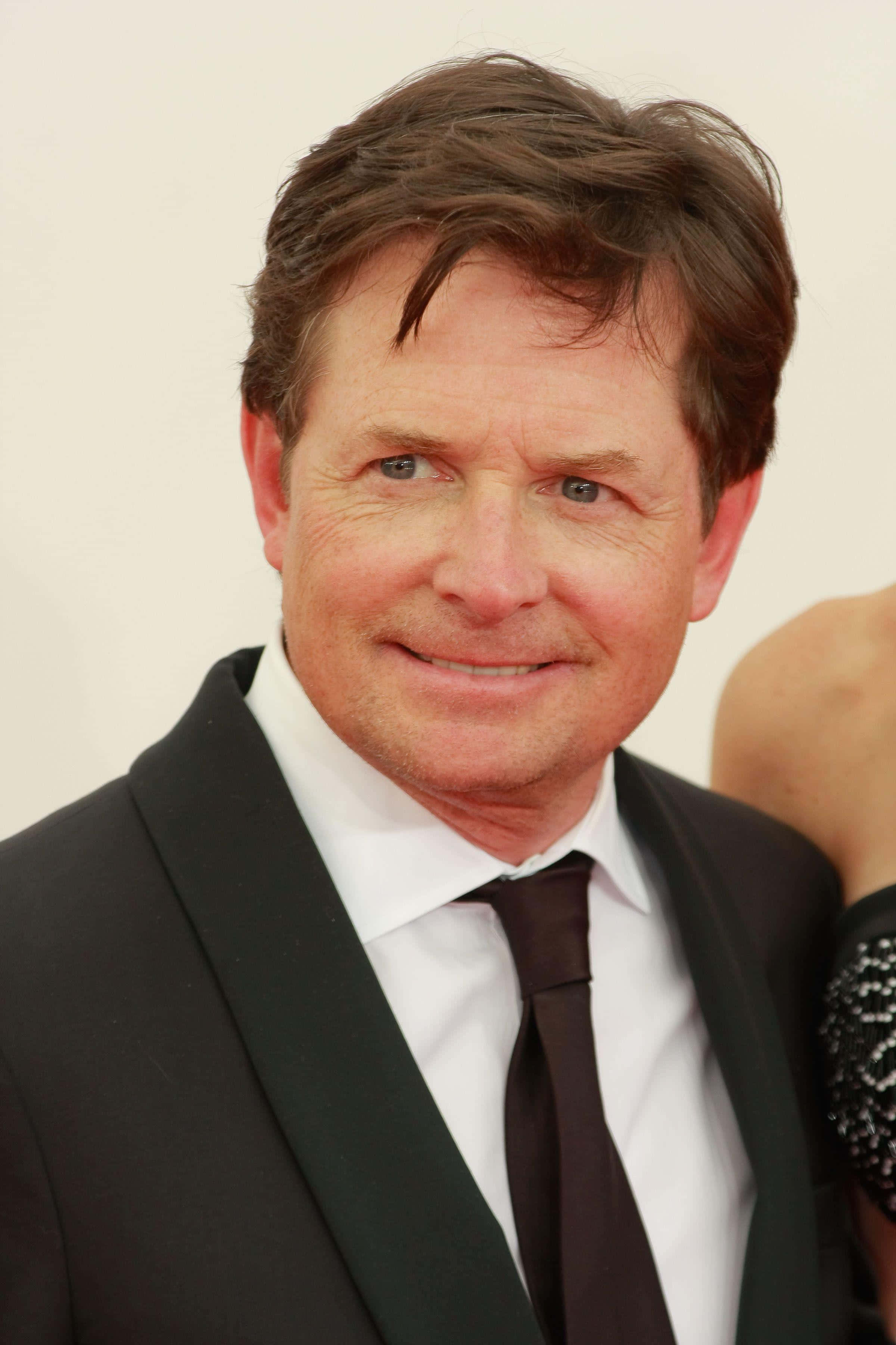Michael J Fox, black suit, tie, 2K Phone Wallpaper