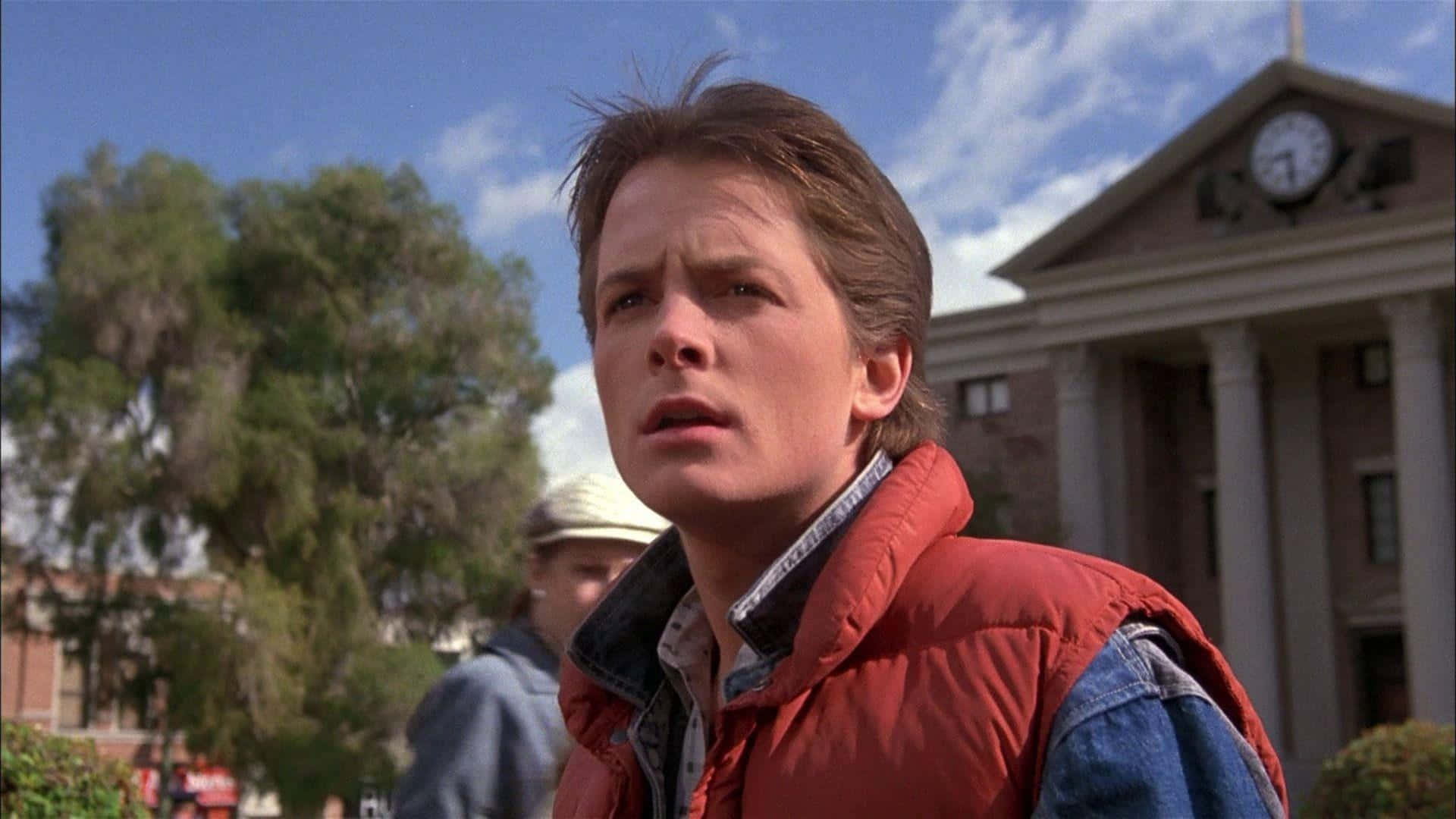 Michael J. Fox, red puffer vest, clock tower building, Full HD Desktop Wallpaper
